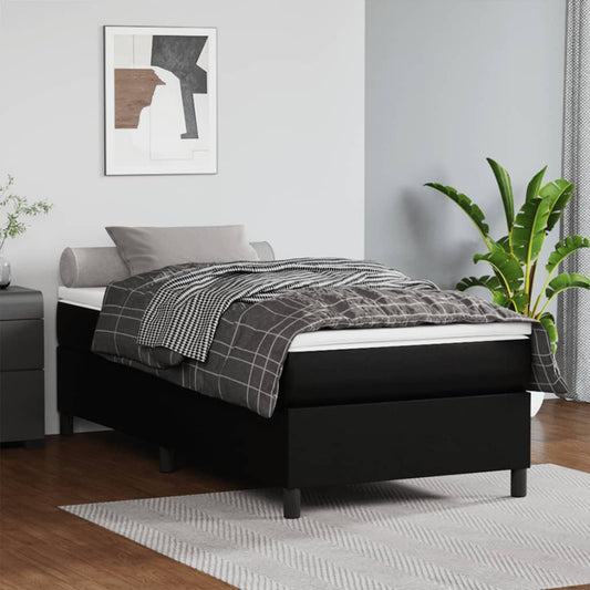 Black divan bed with grey and white checked bedding