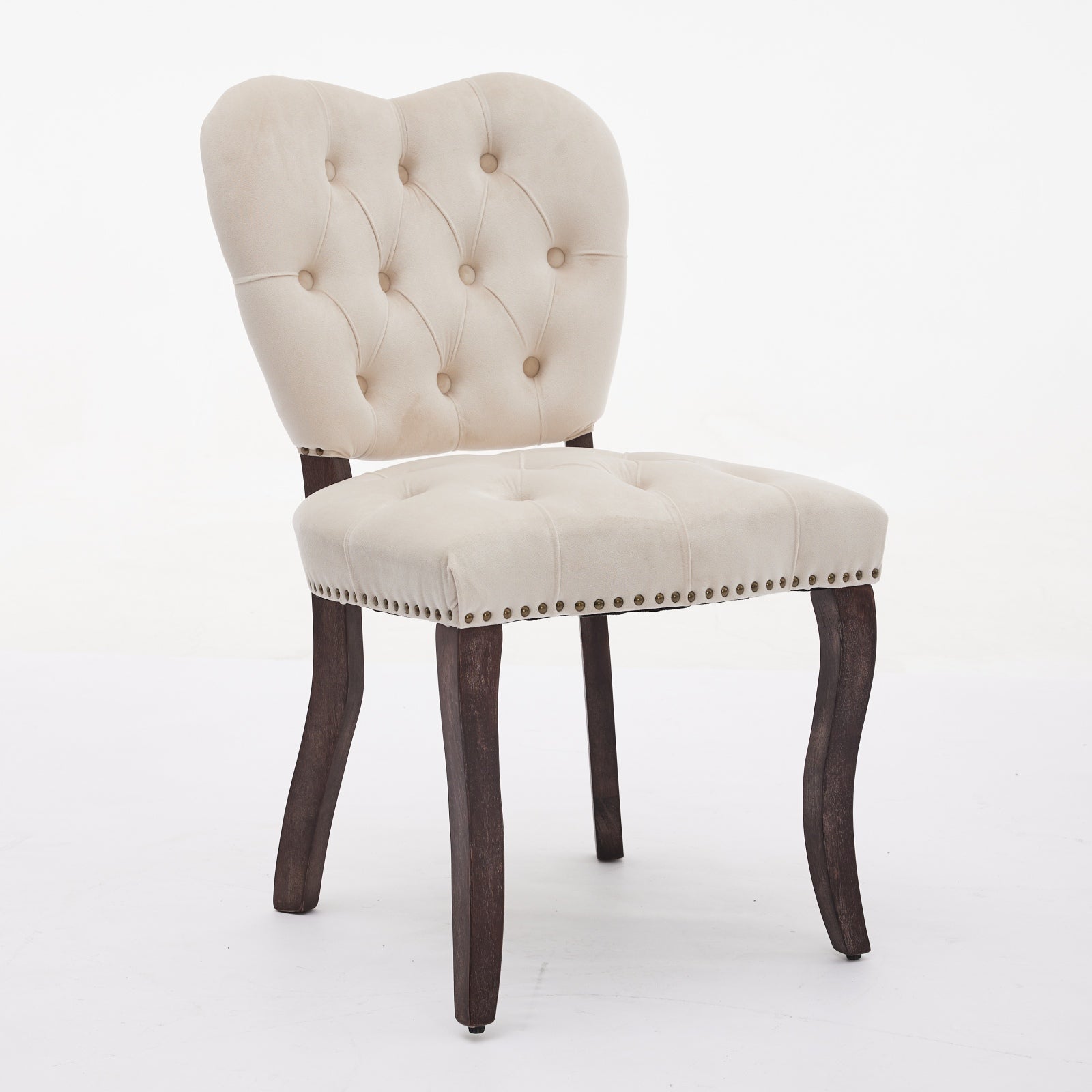 Tufted beige velvet accent chair with dark wood legs