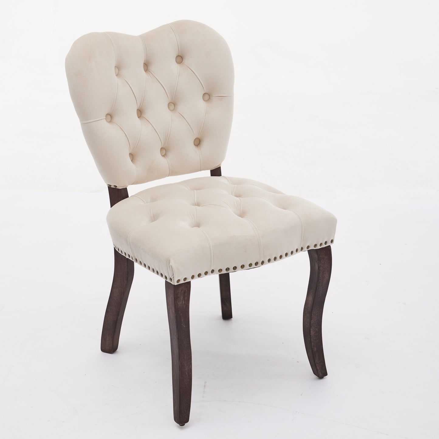 Cream velvet accent chair with tufted back and seat