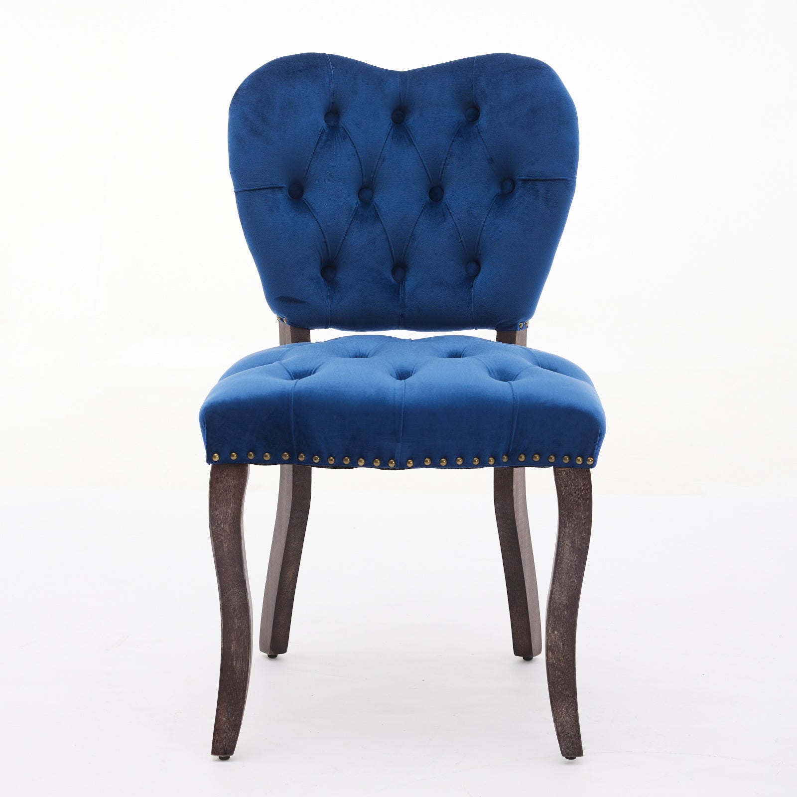 Deep blue velvet accent chair with tufted back and seat