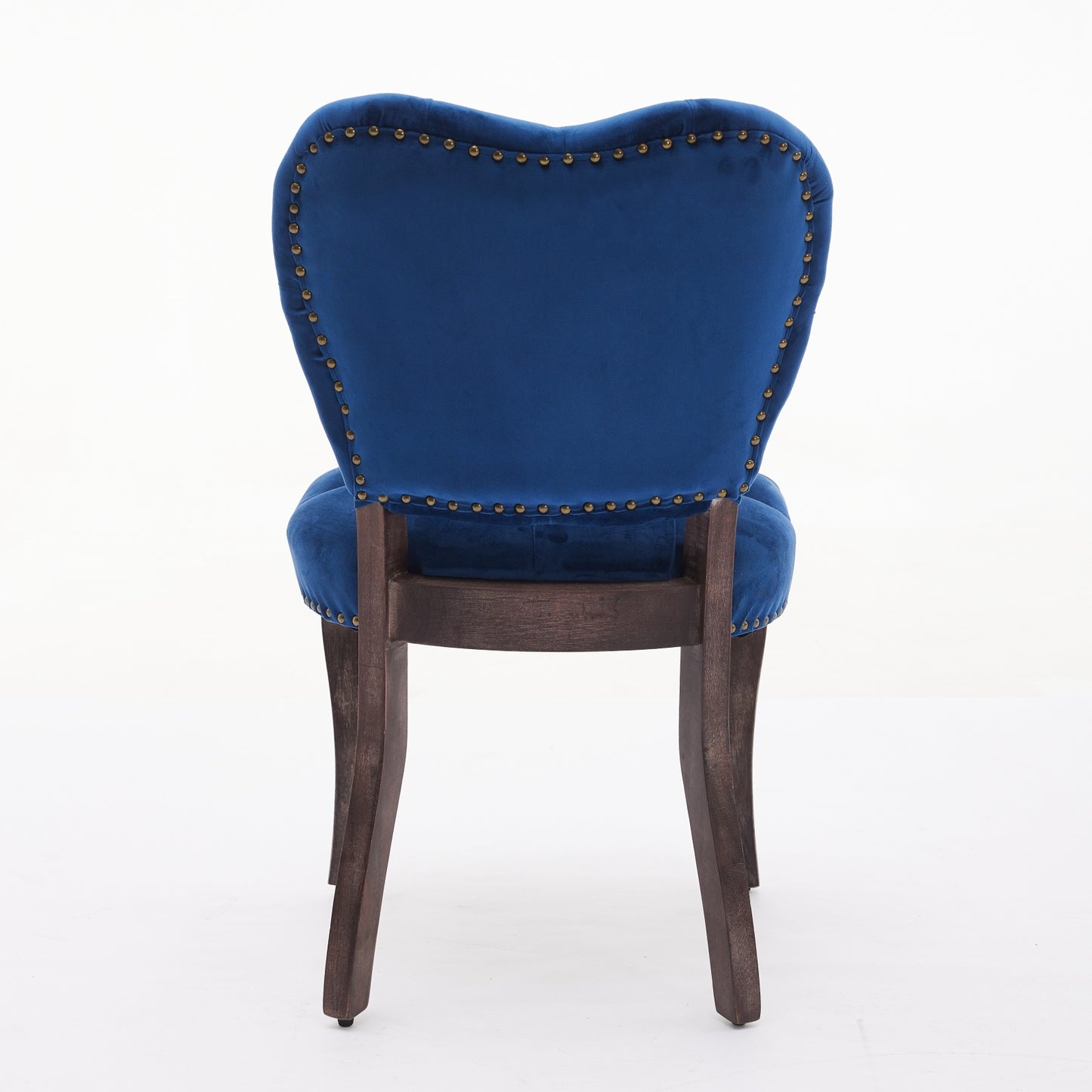 Blue velvet dining chair with brass nailhead trim