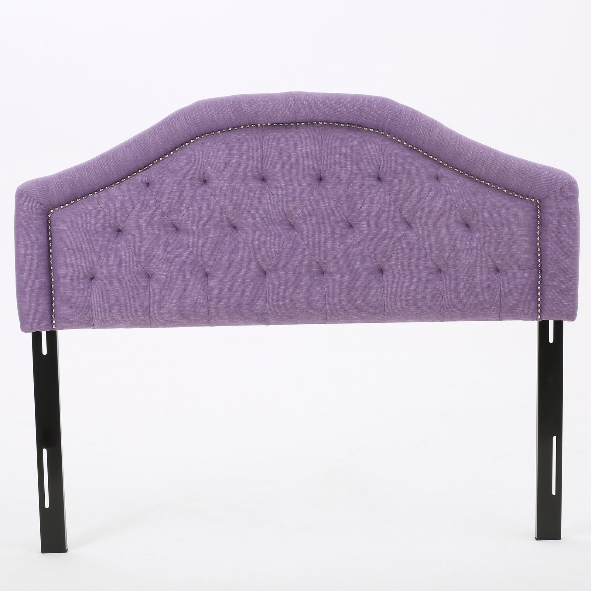 Purple tufted headboard with silver nailhead trim and black metal legs
