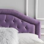 Purple velvet tufted headboard with silver nailhead trim
