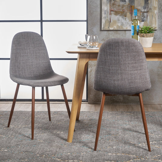 Gray fabric dining chair with tapered wooden legs