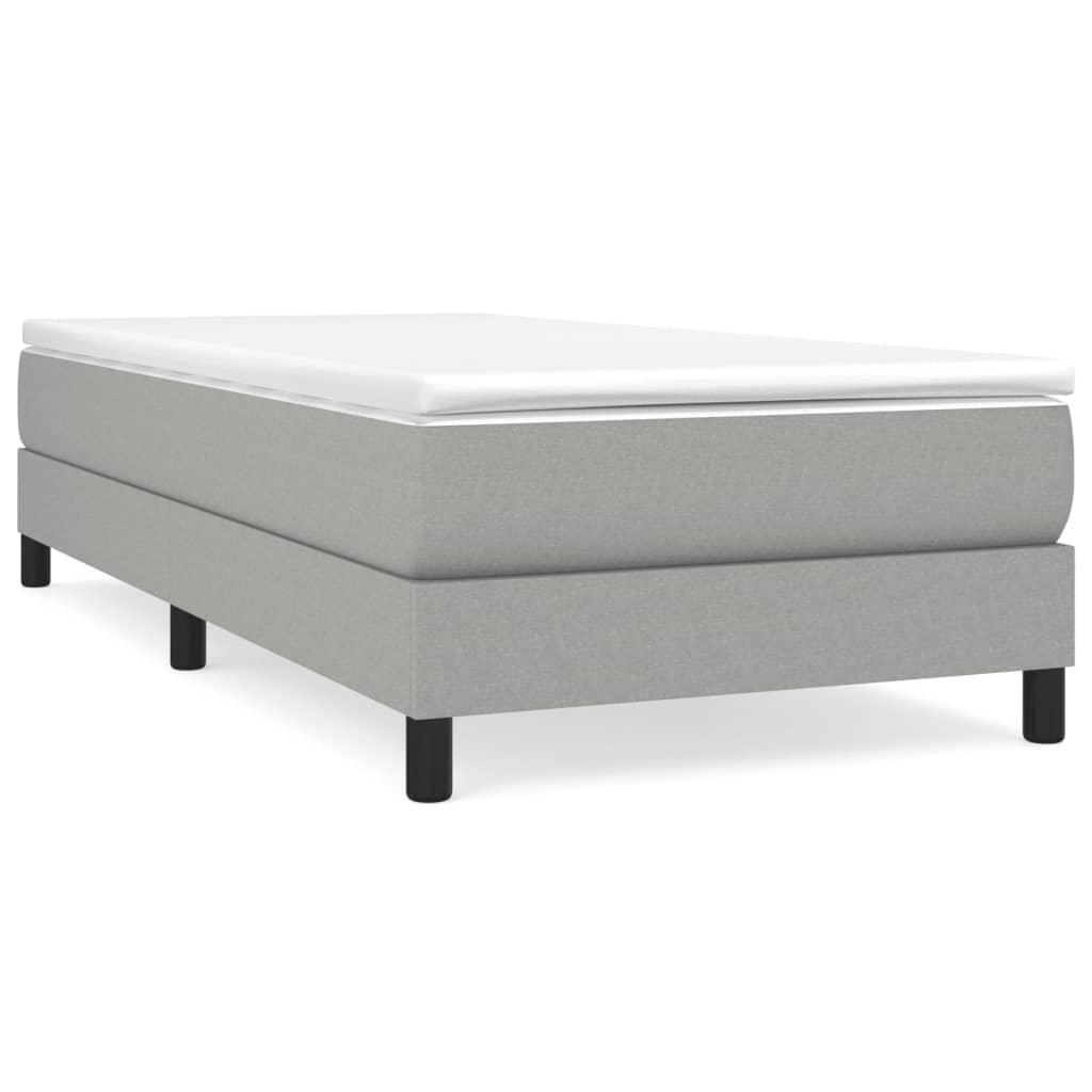 Line drawing of a single bed frame with dimensions marked