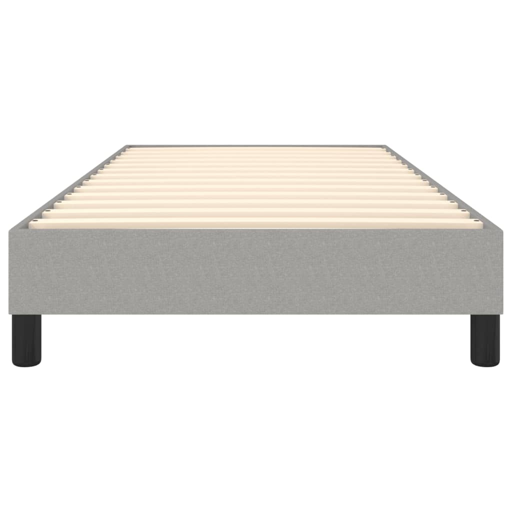 Modern gray upholstered twin bed frame with wooden slats