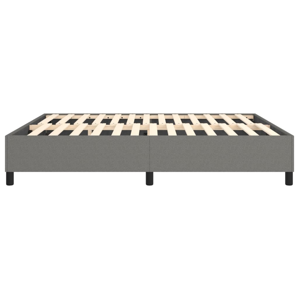 Grey upholstered platform bed frame with wooden slats