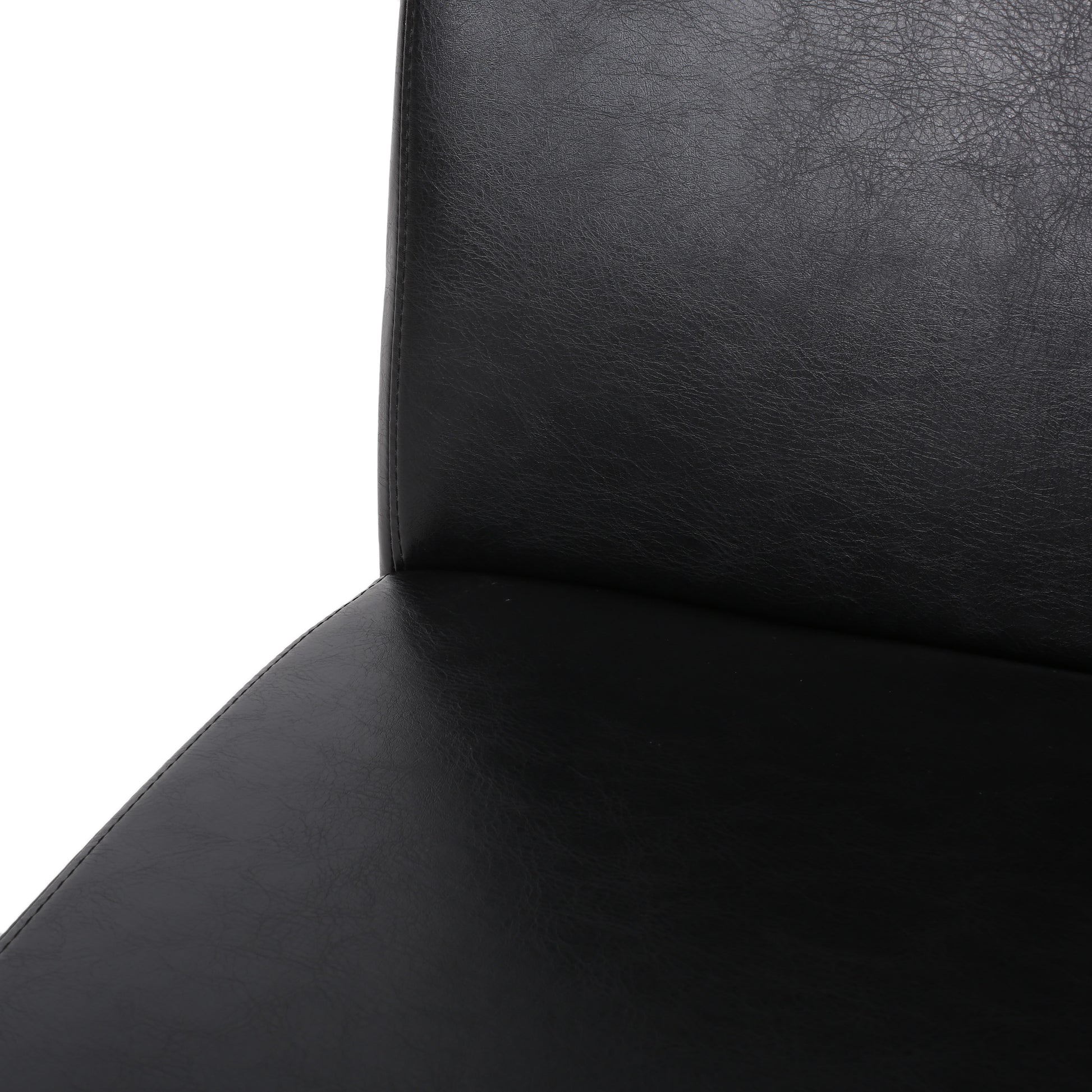 Black faux leather seat cushion with textured surface