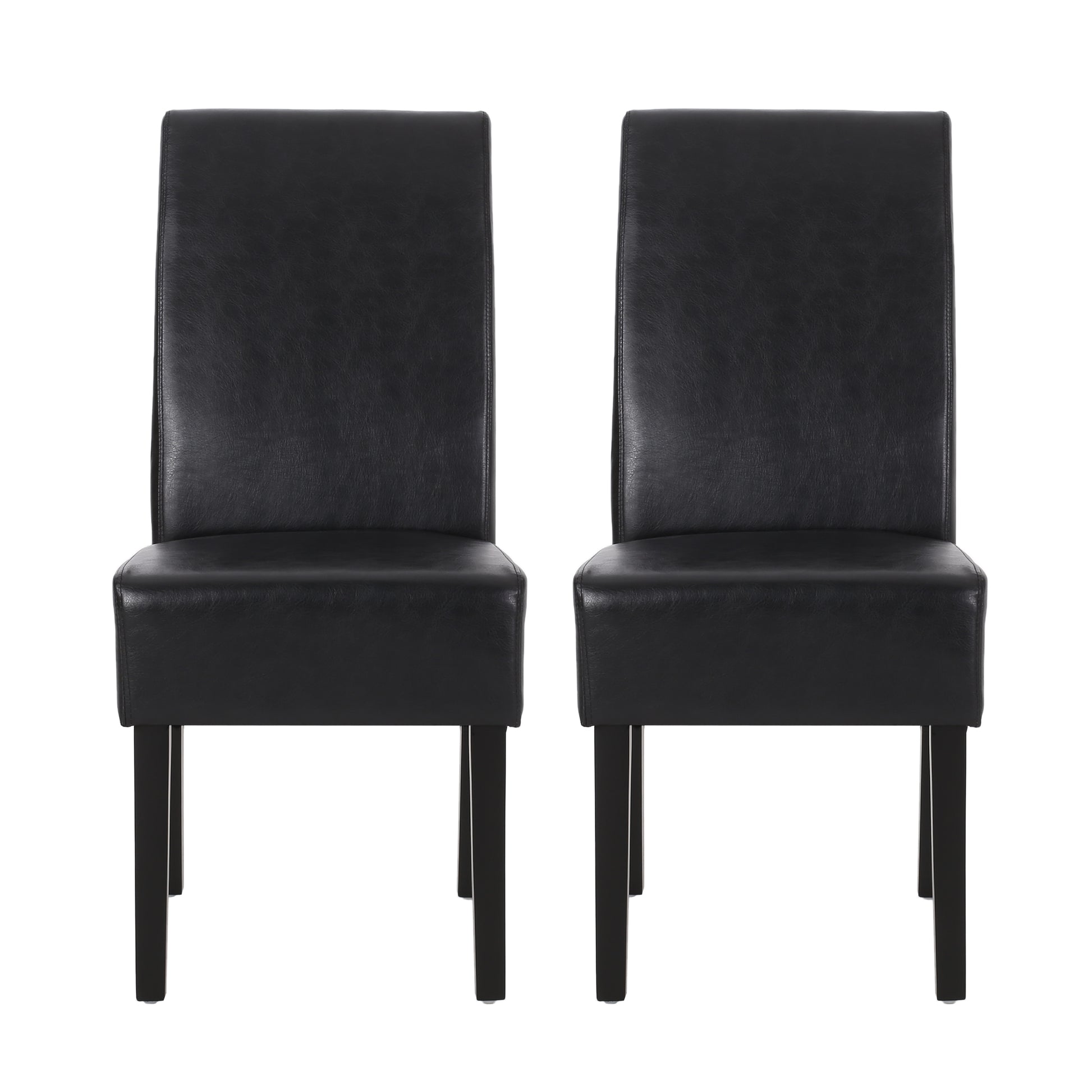 Two black faux leather dining chairs with wooden legs