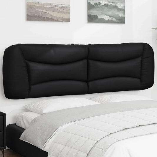 Black upholstered headboard with tufted paneling for a modern bedroom