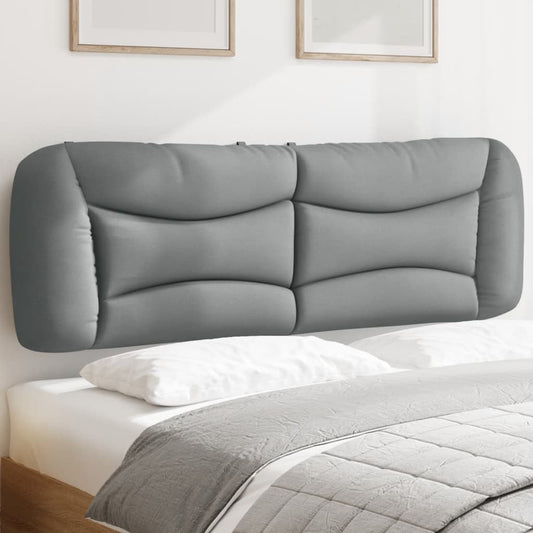Gray upholstered headboard with curved panel design