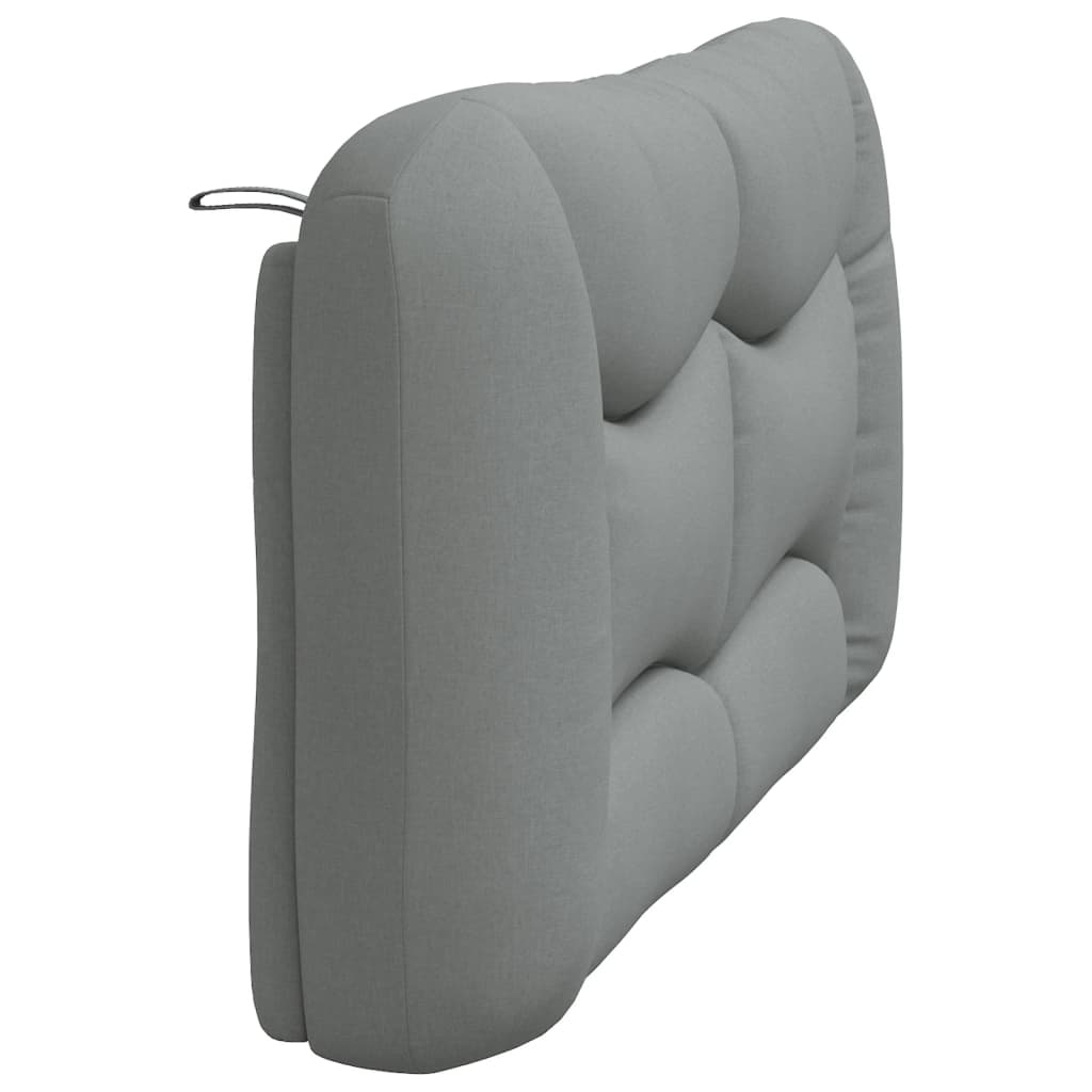 Padded gray headboard with curved stitch detailing