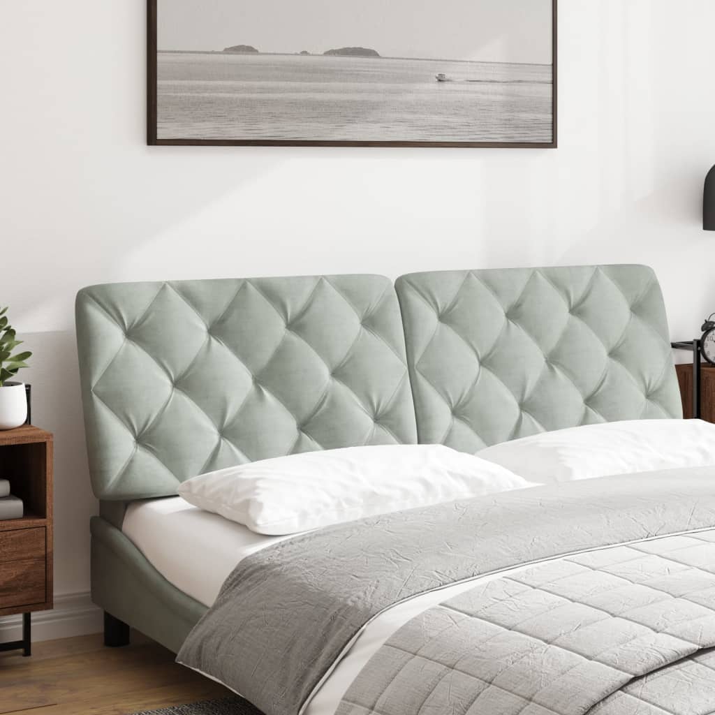Light gray tufted headboard panels with diamond stitching