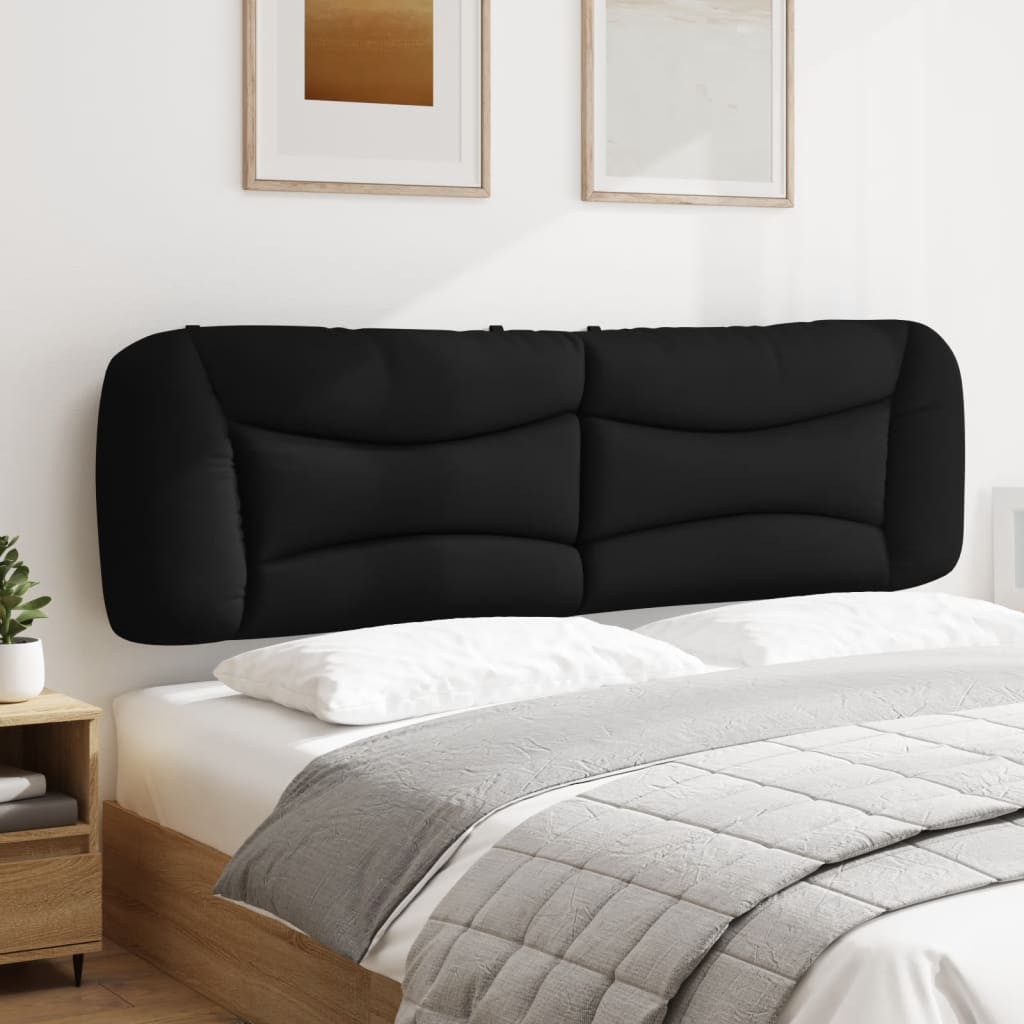 Black upholstered headboard with quilted detailing