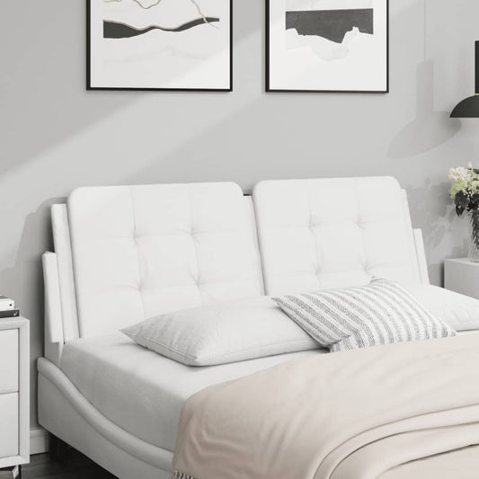 Tufted white futon sofa with plush pillows and a soft blanket