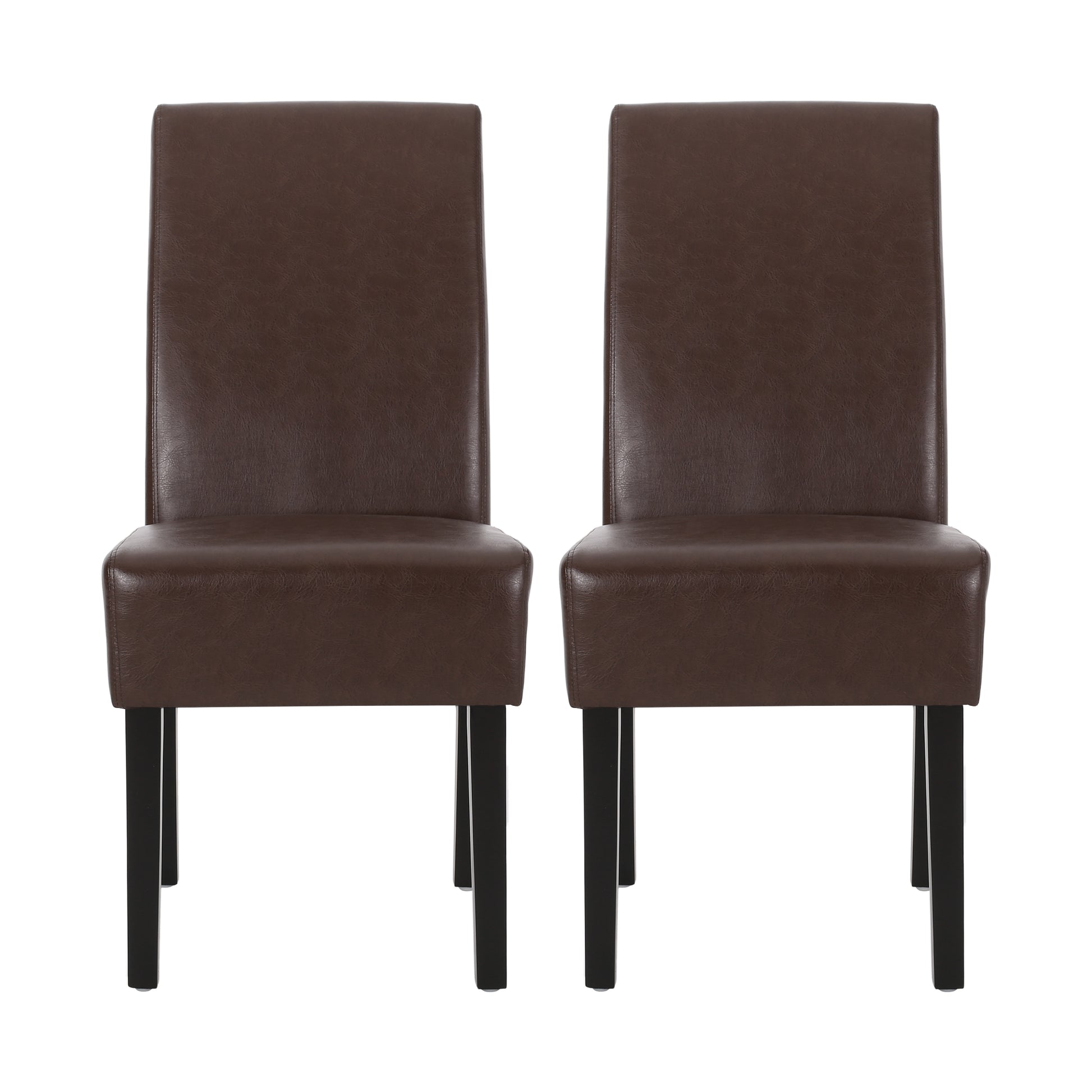 Two brown faux leather dining chairs with black legs