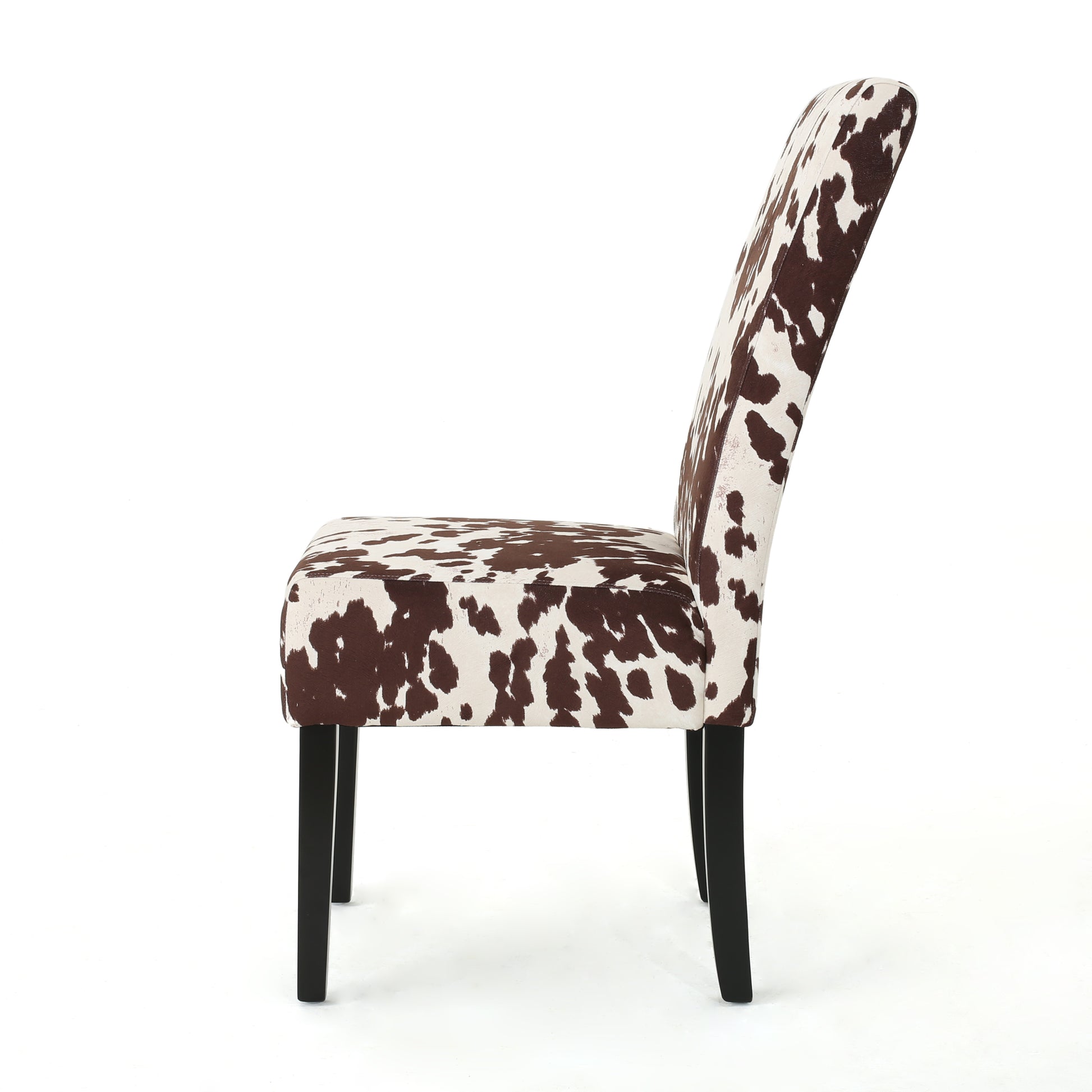 Brown and white cowhide pattern dining chair with black legs