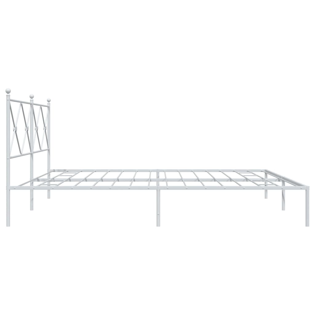 White metal bed frame with decorative headboard detail