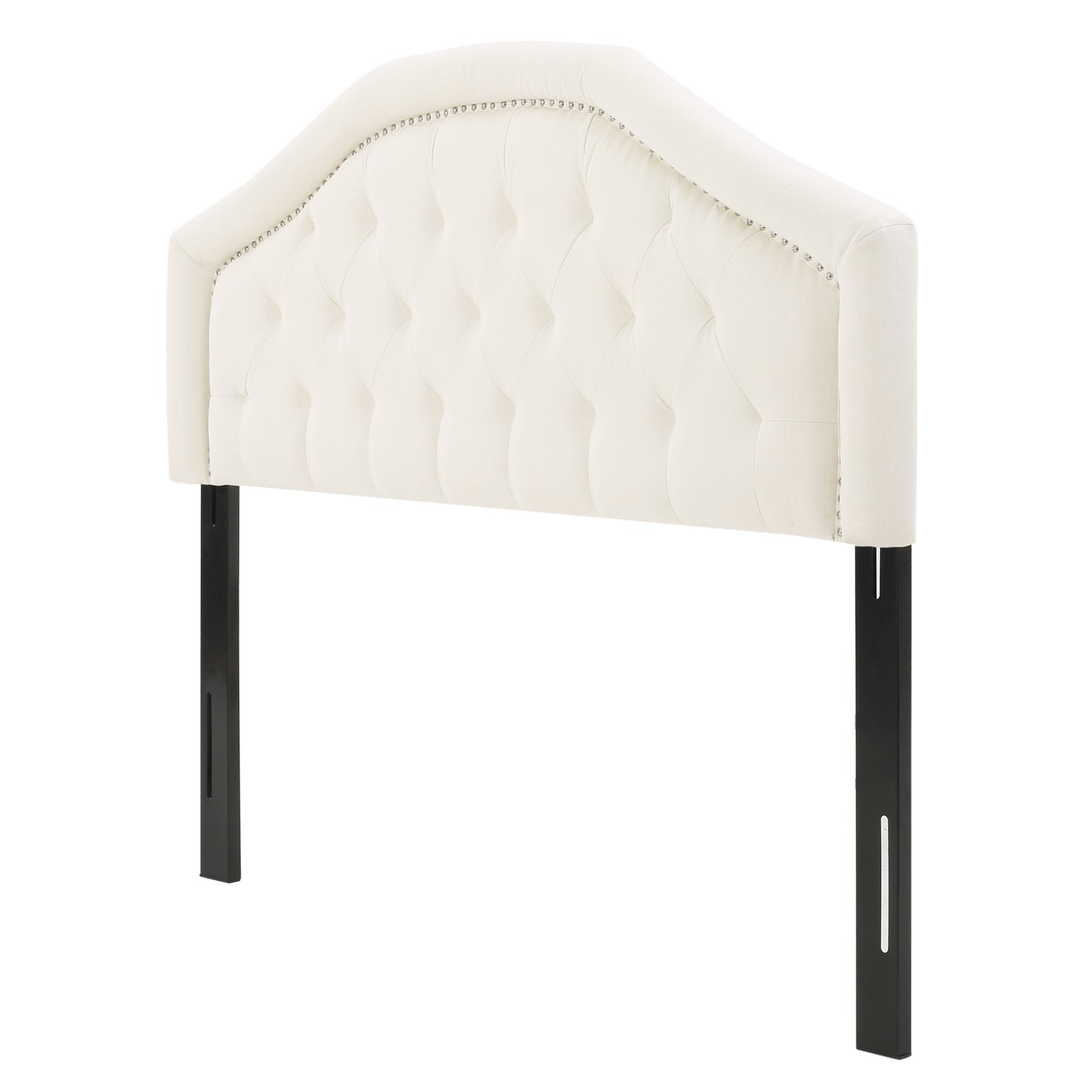 Cream velvet arched headboard with button tufting and nailhead trim