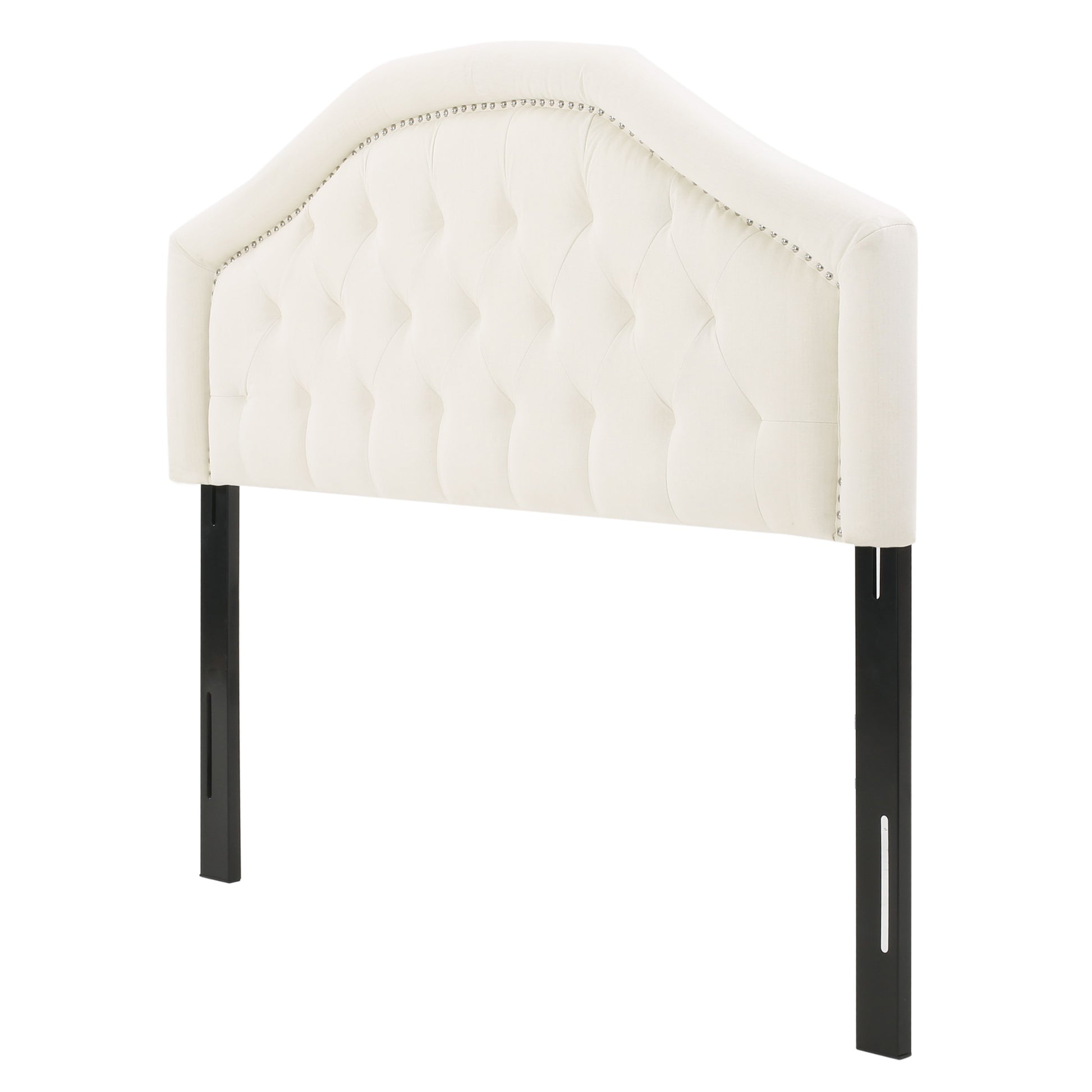 Cream velvet arched headboard with button tufting and nailhead trim