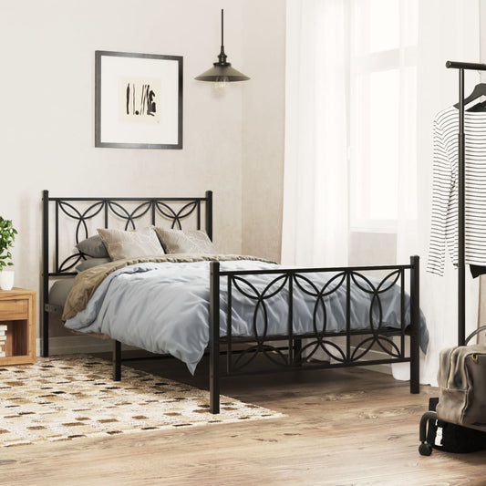 Black metal bed frame with circular scrollwork headboard and footboard queen size