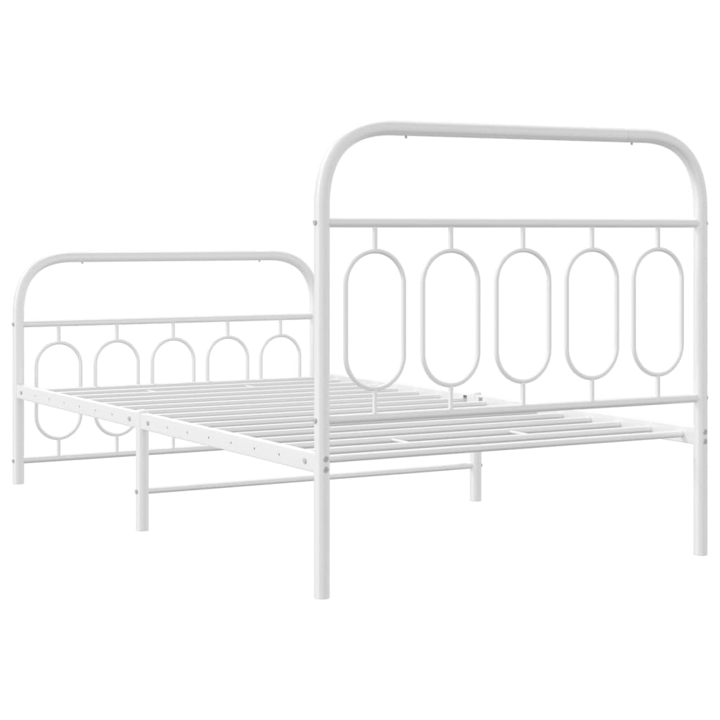 White metal twin bed frame with decorative headboard and footboard