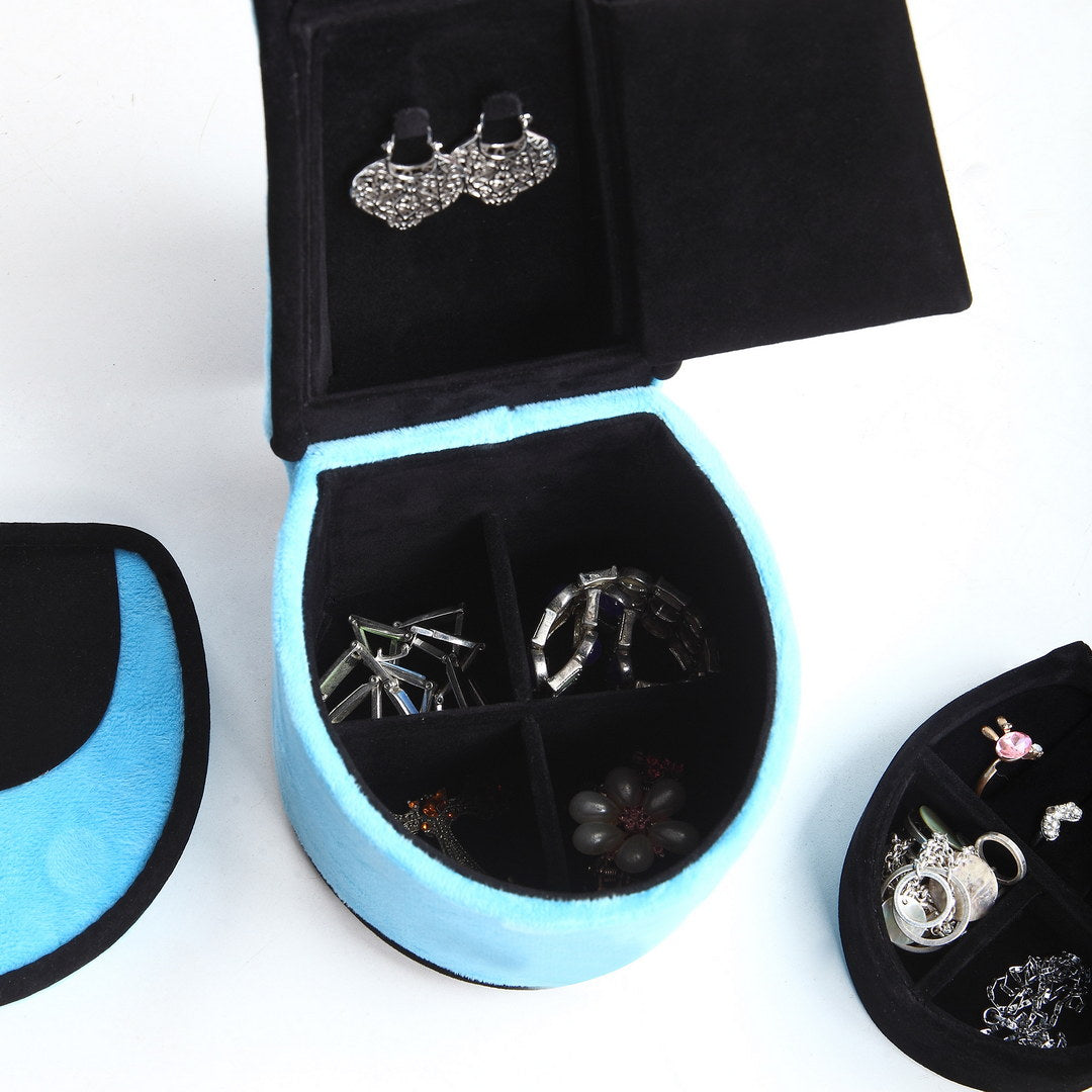 Fluffy blue jewelry organizer with silver earrings