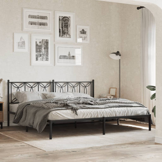 Black metal bed frame with decorative headboard and upholstered mattress