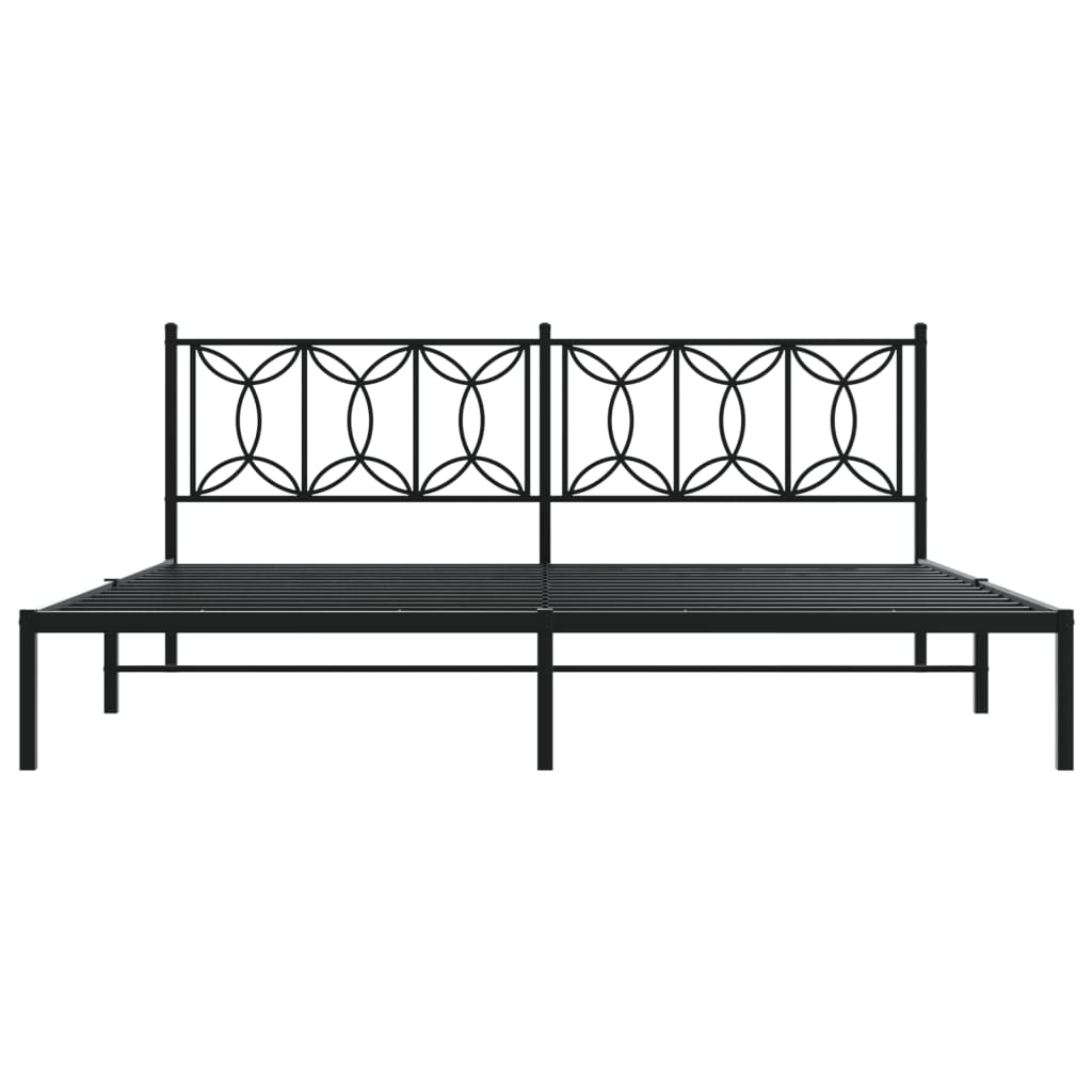 Black metal bed frame with ornate geometric headboard