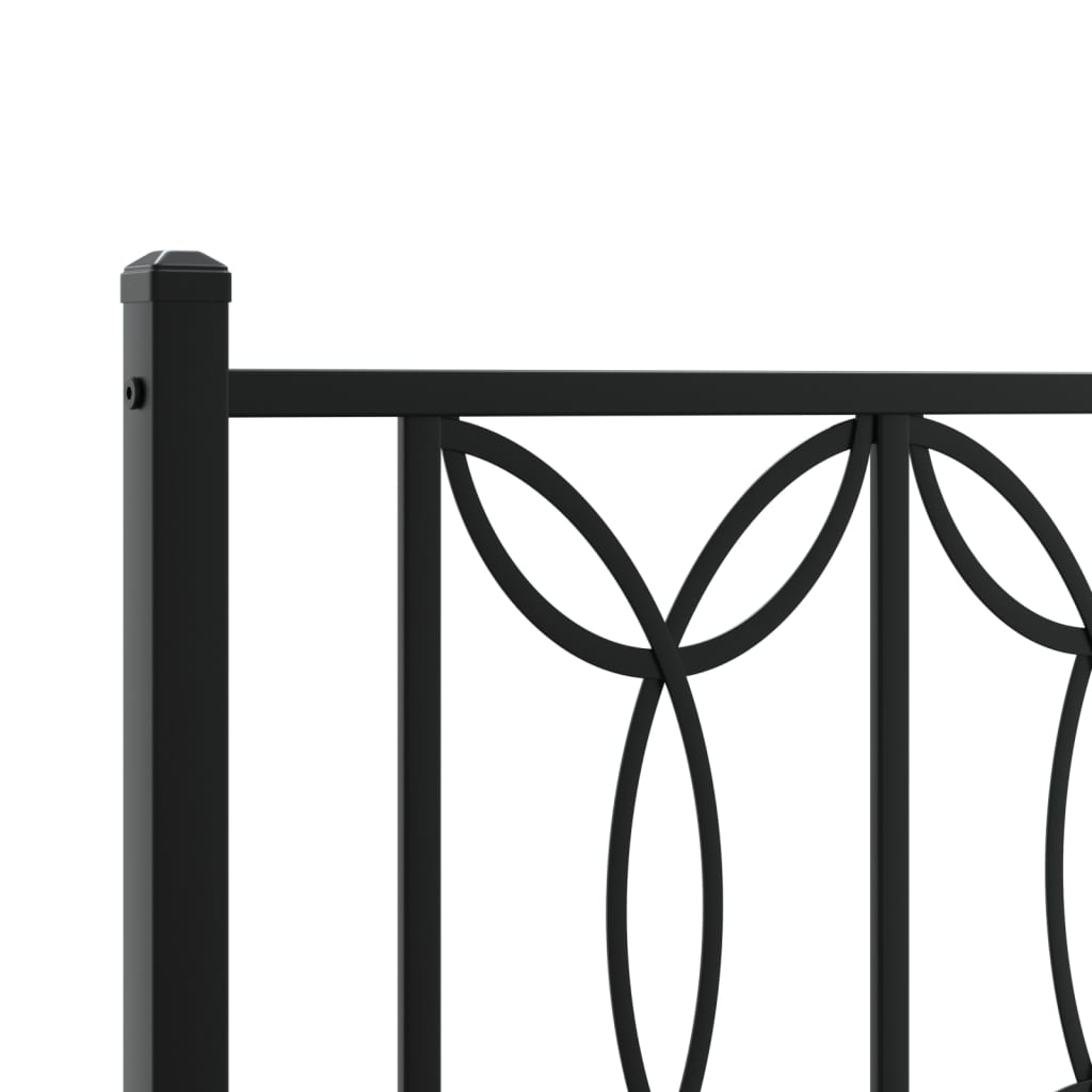 Black metal bed frame with decorative headboard and footboard
