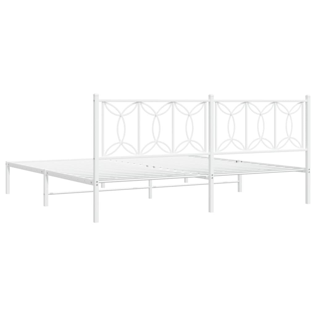 White metal bed frame with ornate headboard detail