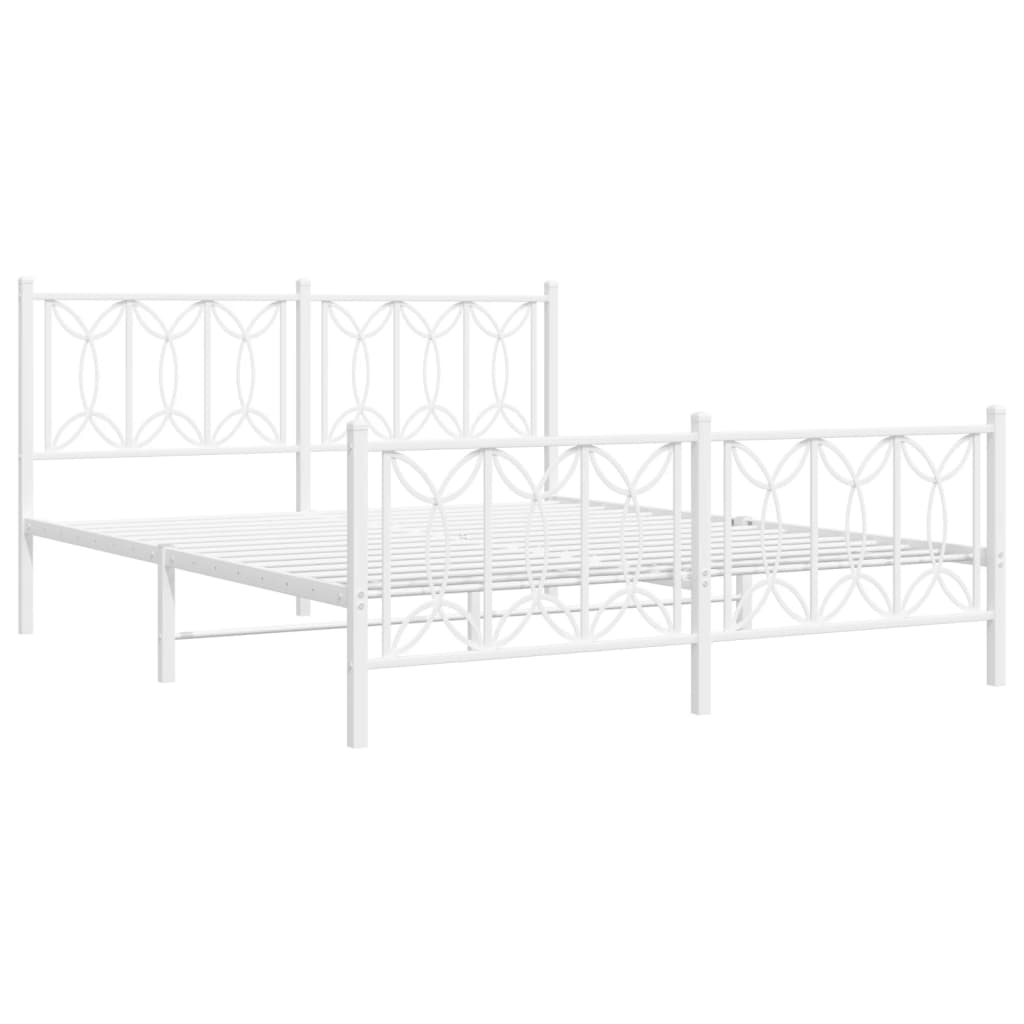 White metal bed frame with ornate headboard and footboard detailing featuring grey bedding