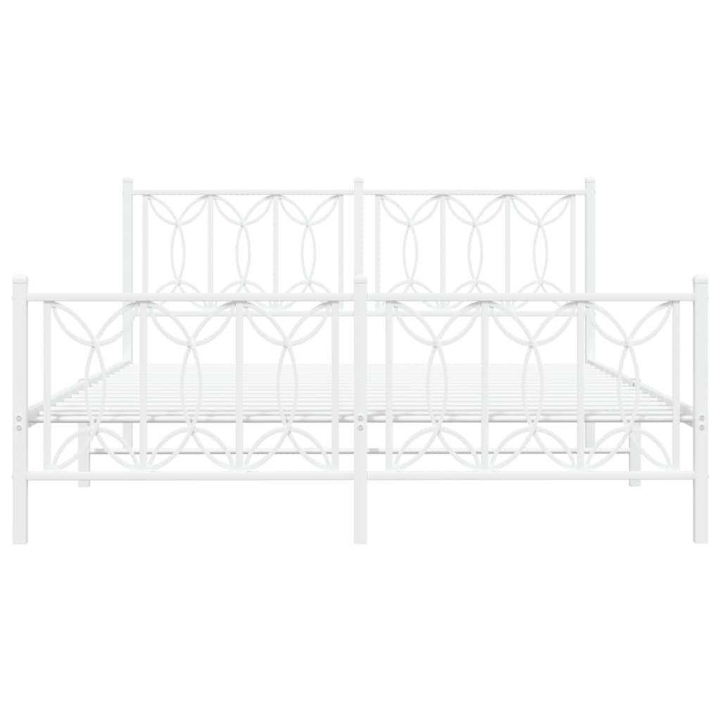 White metal bed frame with decorative headboard and footboard