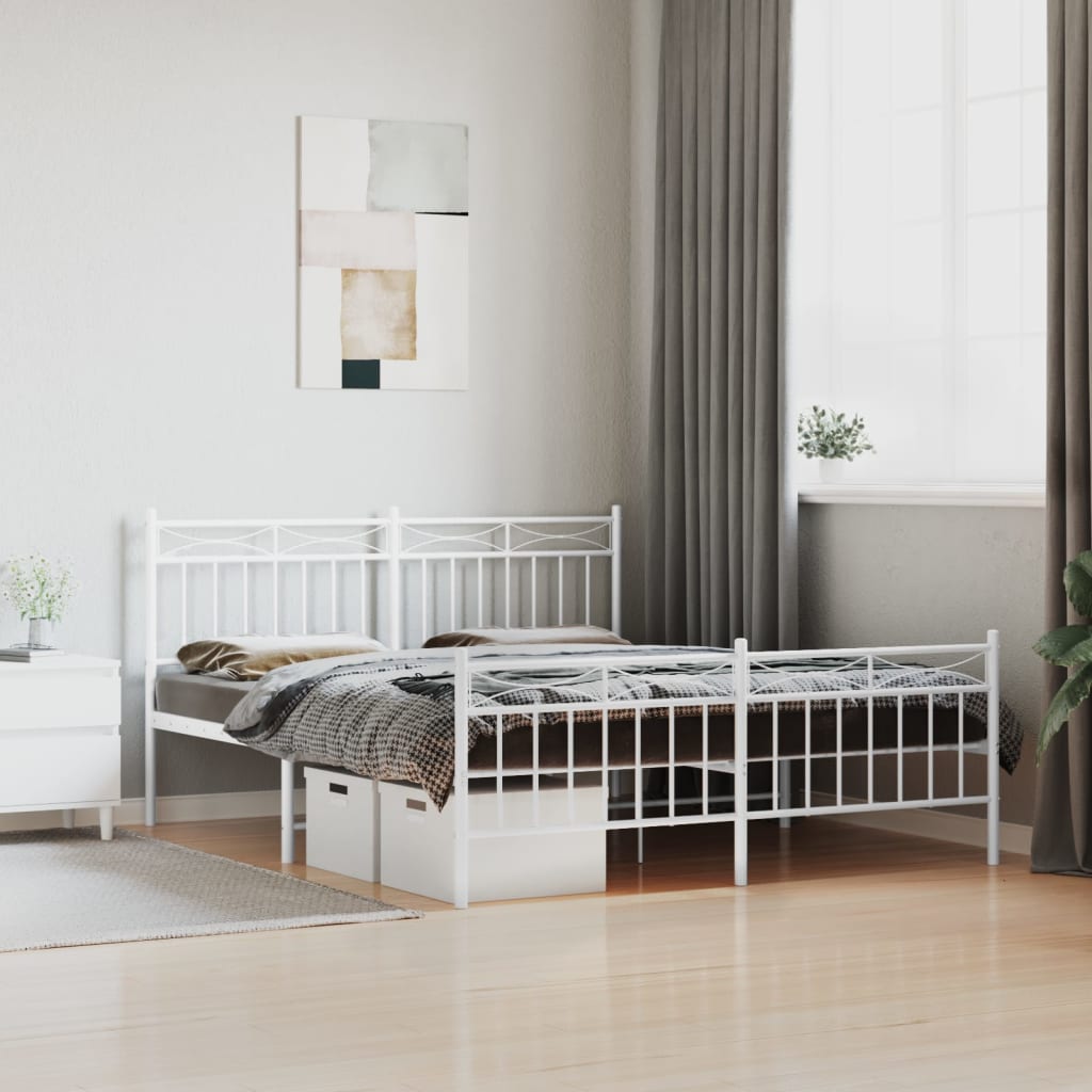 White metal bed frame with ornate headboard and footboard