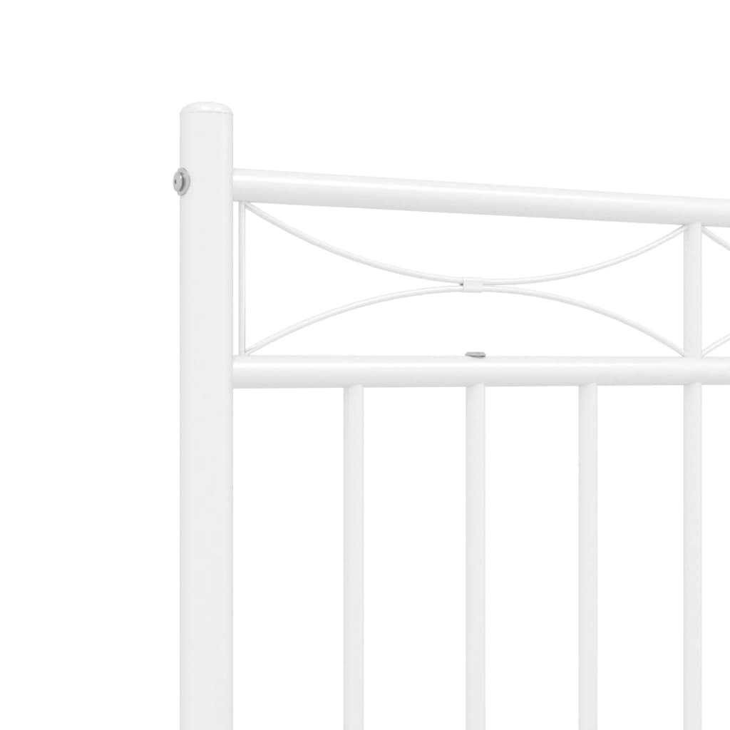 White metal twin bed frame with decorative headboard and footboard
