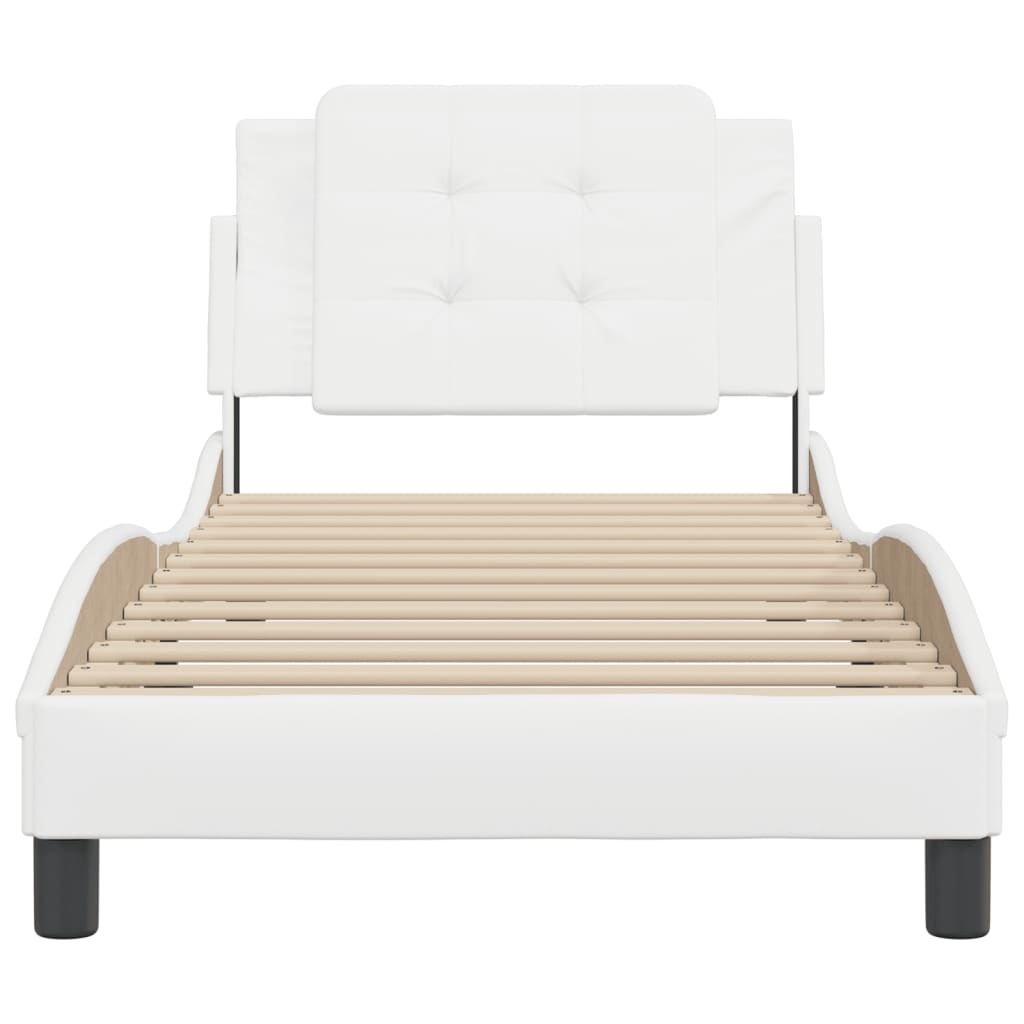 White upholstered twin bed frame with tufted headboard and wooden slats
