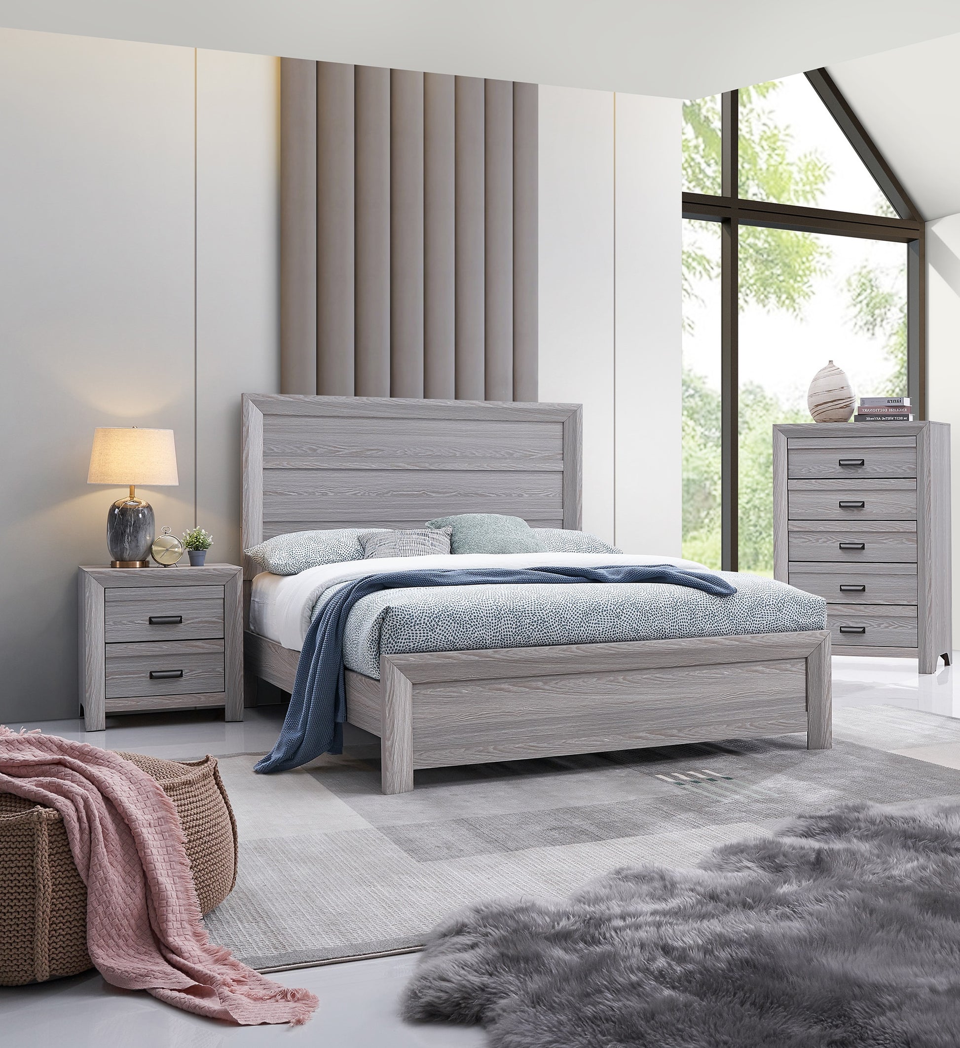 Grey wood king bed with tufted headboard and modern nightstand