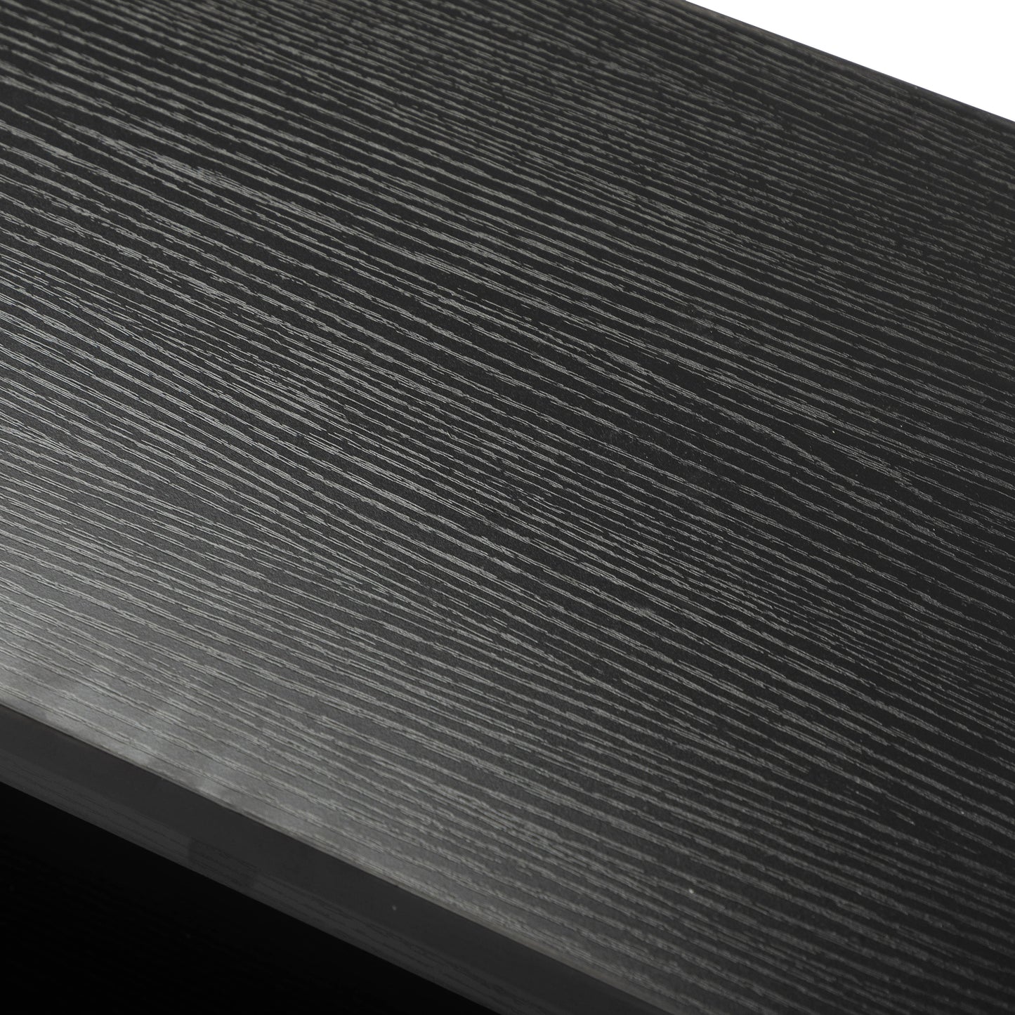 Black textured wood grain laminate surface