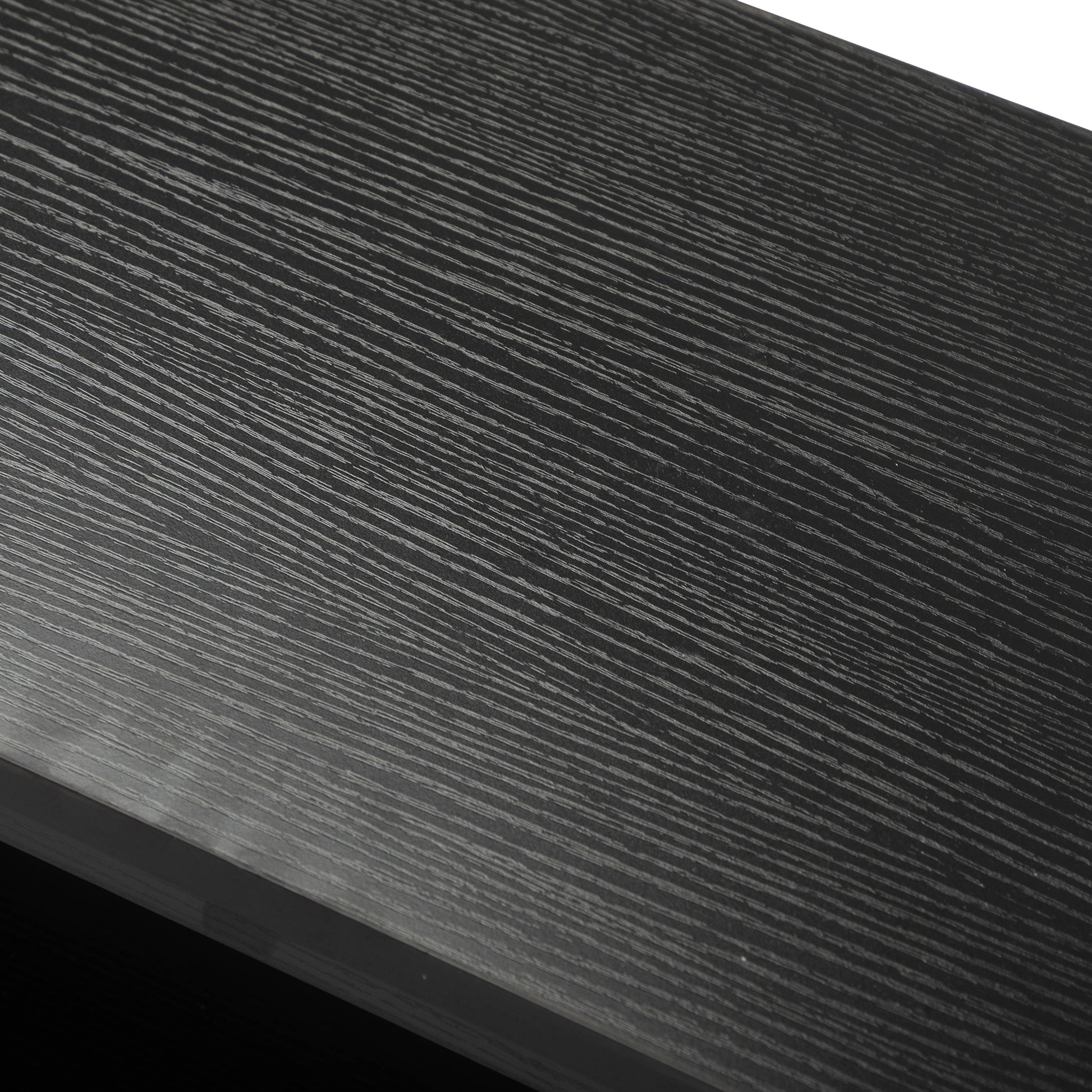 Black textured wood grain laminate surface
