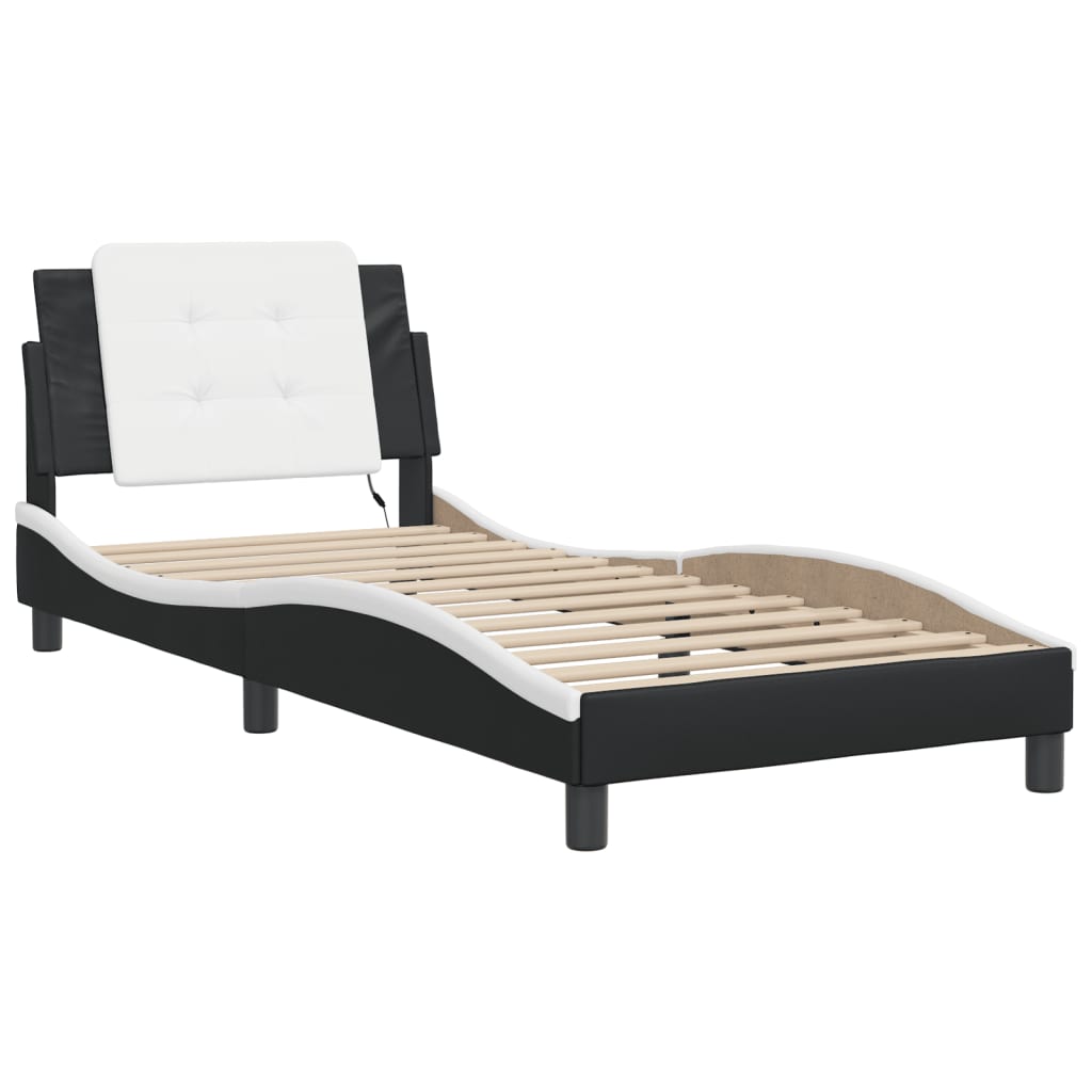 Black and white upholstered twin bed frame with adjustable RGB LED headboard