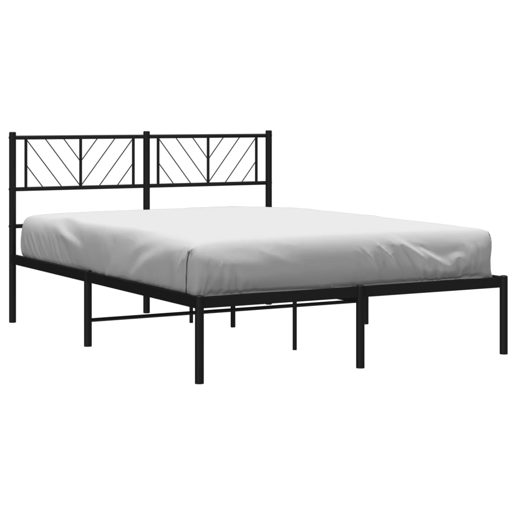 Black metal bed frame with modern geometric headboard and mattress