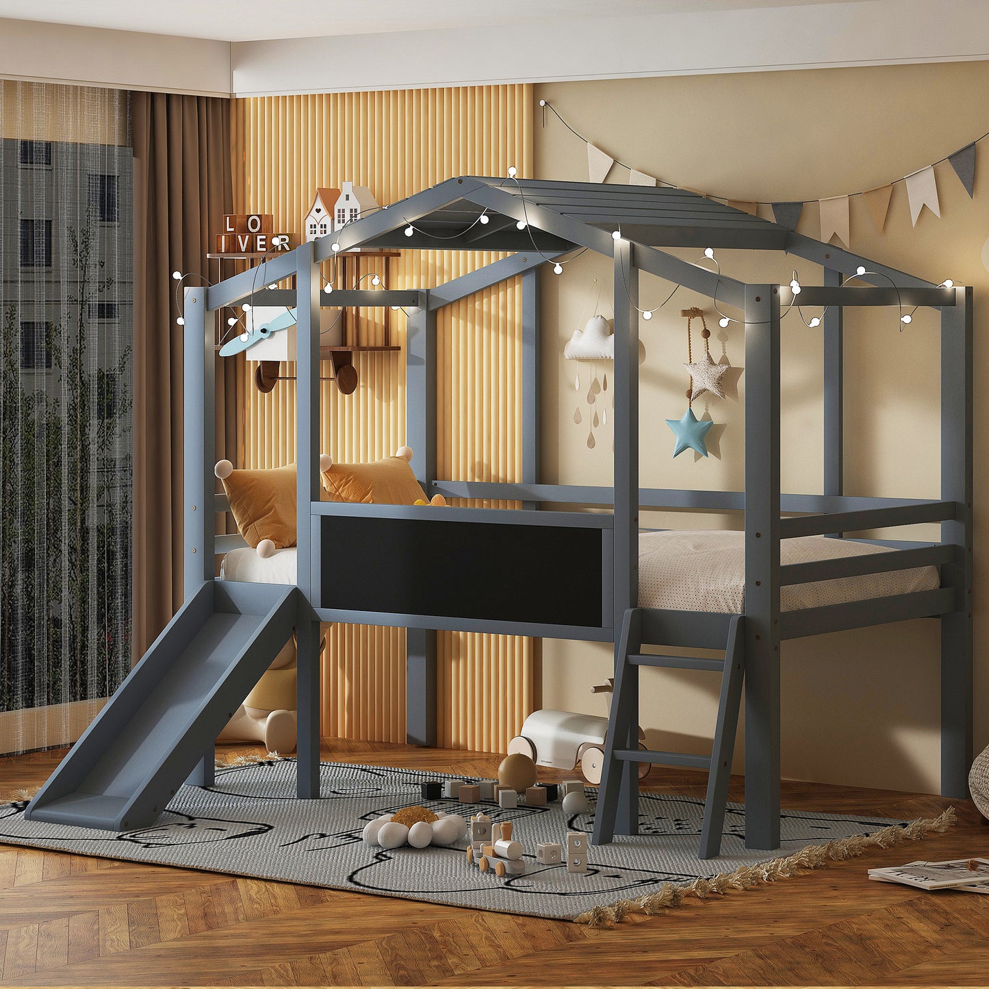 Gray wooden loft bed with slide and ladder featuring a chalkboard front panel for kids