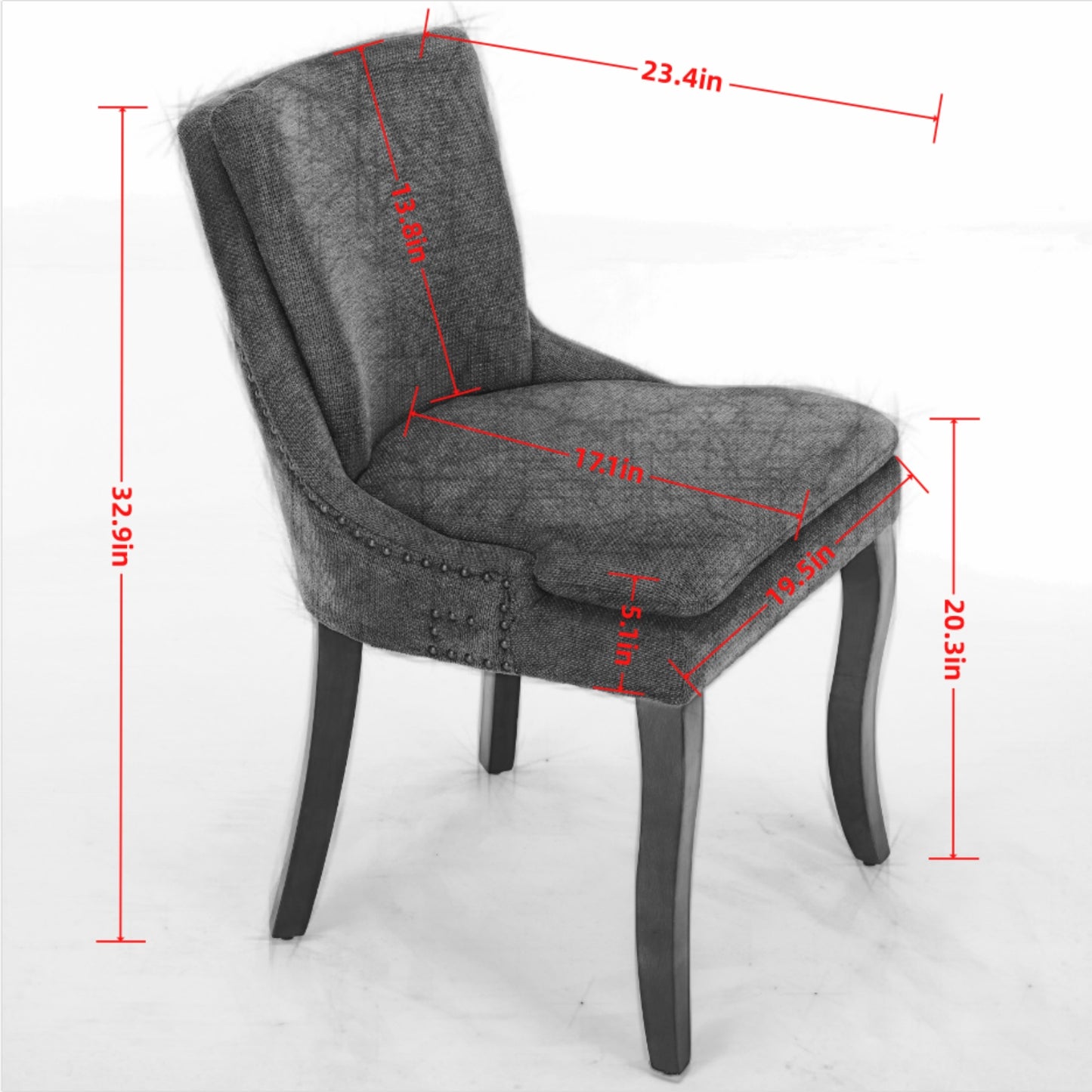 Gray upholstered accent chair with nailhead trim and dark wood legs