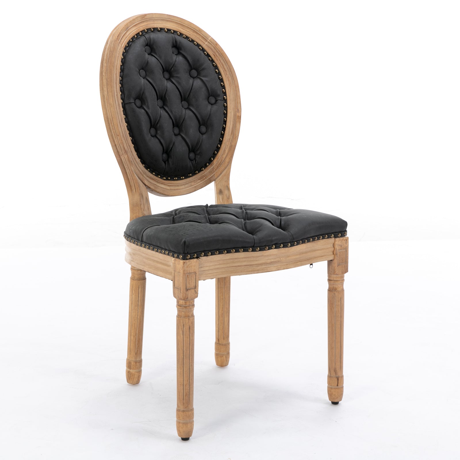 Black tufted upholstered accent chair with distressed wood frame