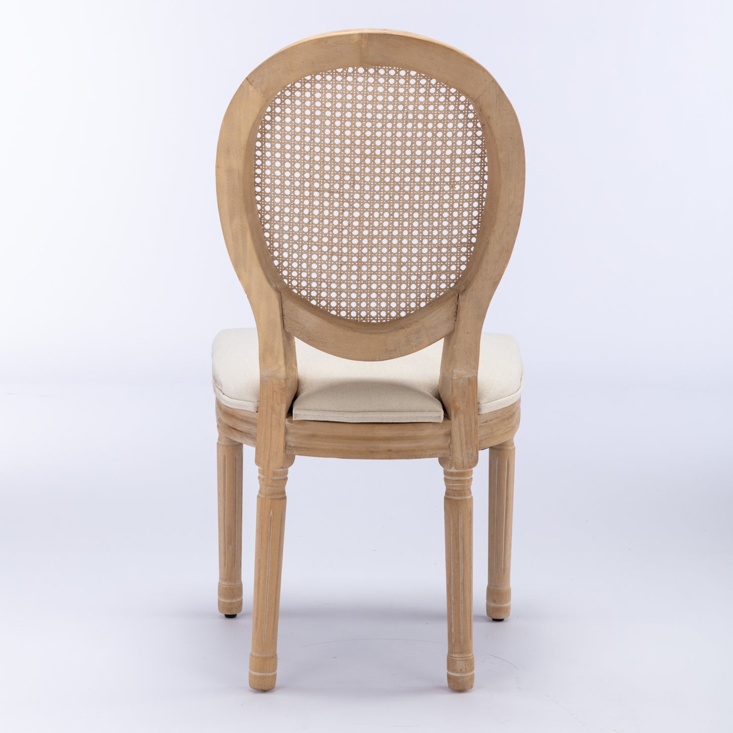 Natural wood armchair with cane back and beige upholstered seat