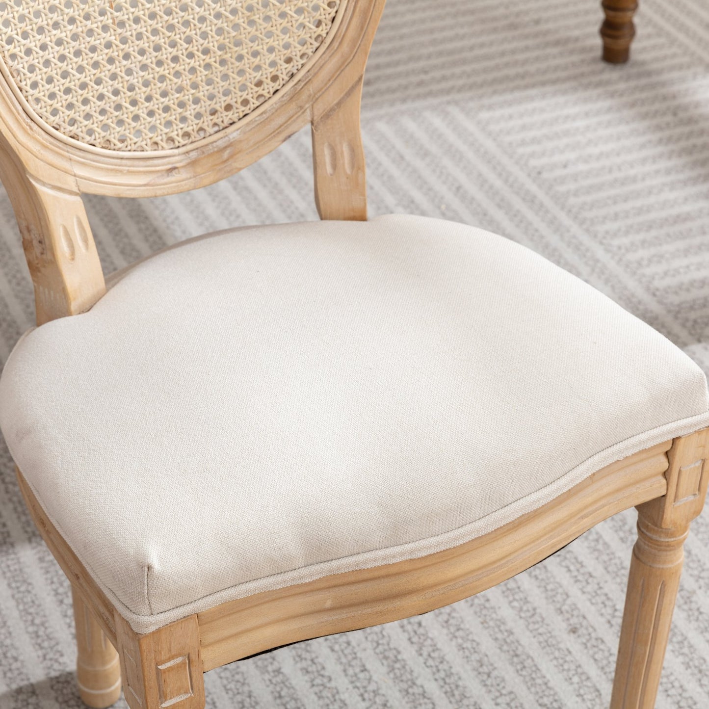 French country armchair with light oak finish and woven back