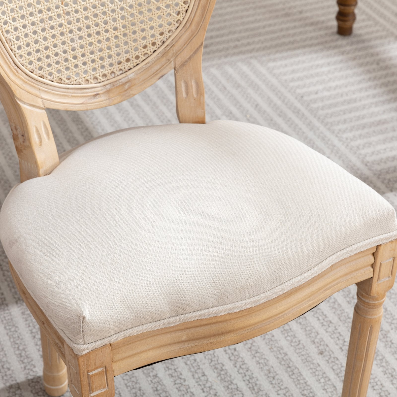 French country armchair with light oak finish and woven back
