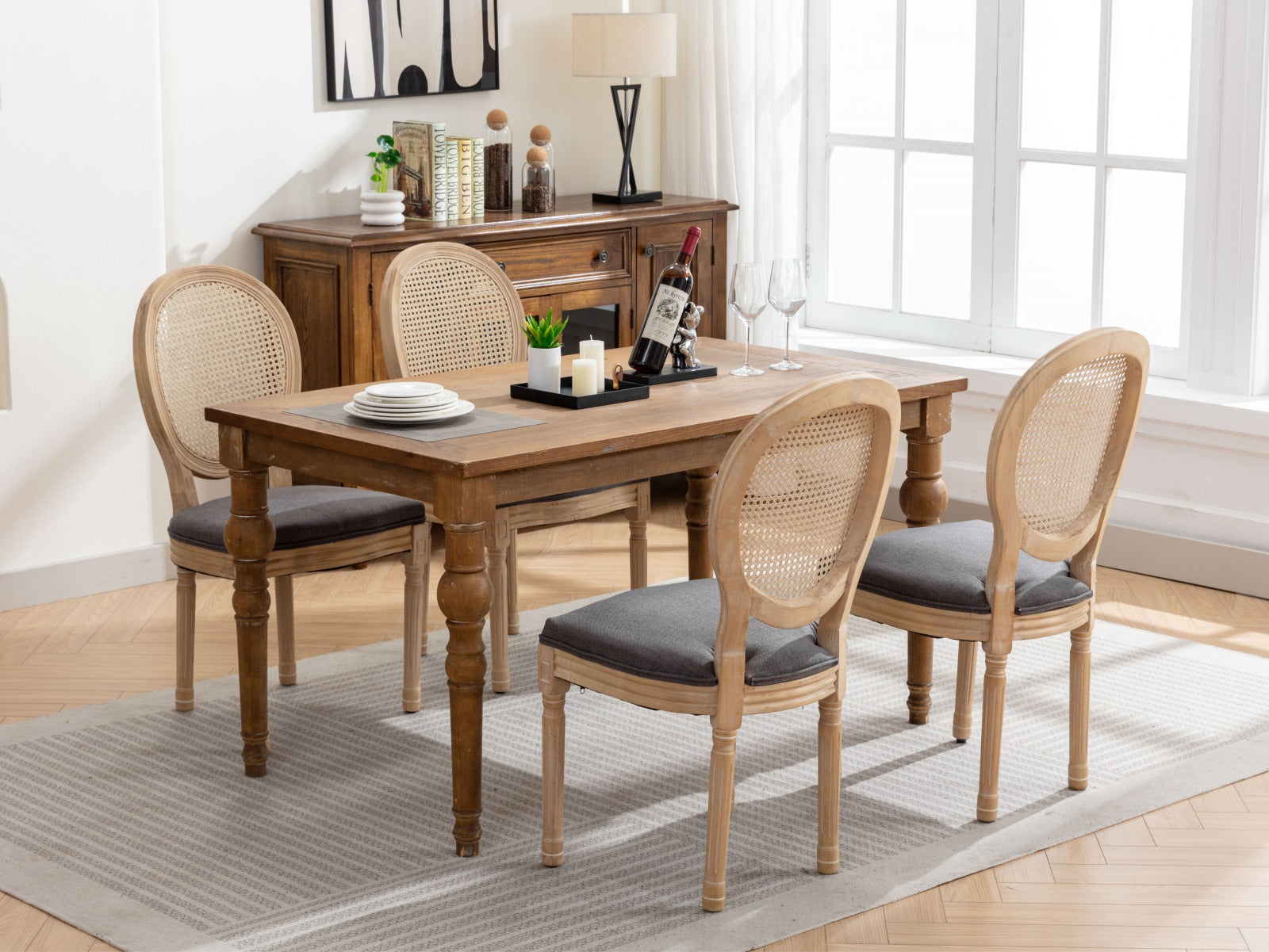 Farmhouse dining chairs with grey upholstered seats and cane backs