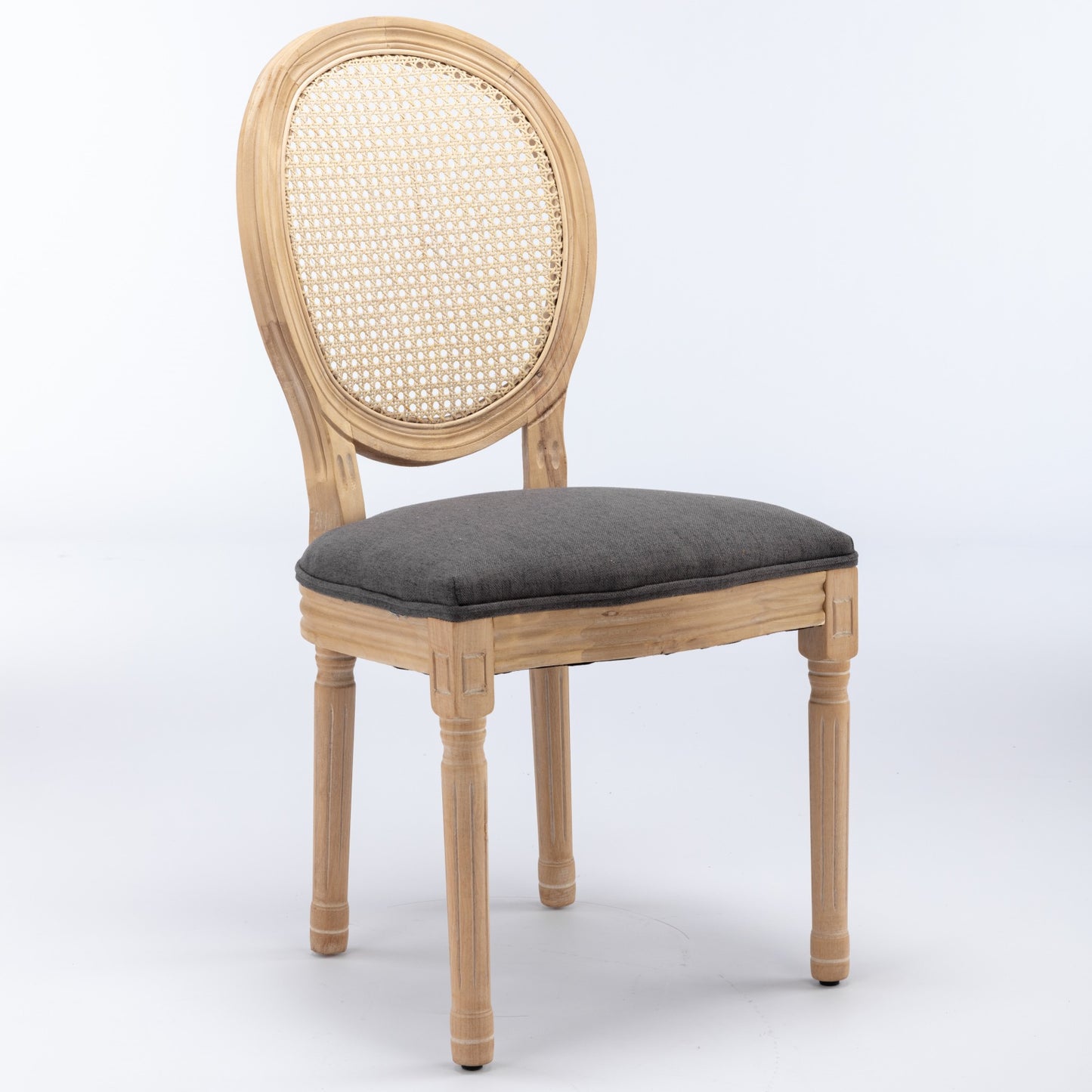Ornate cane back accent chair with dark gray upholstered seat