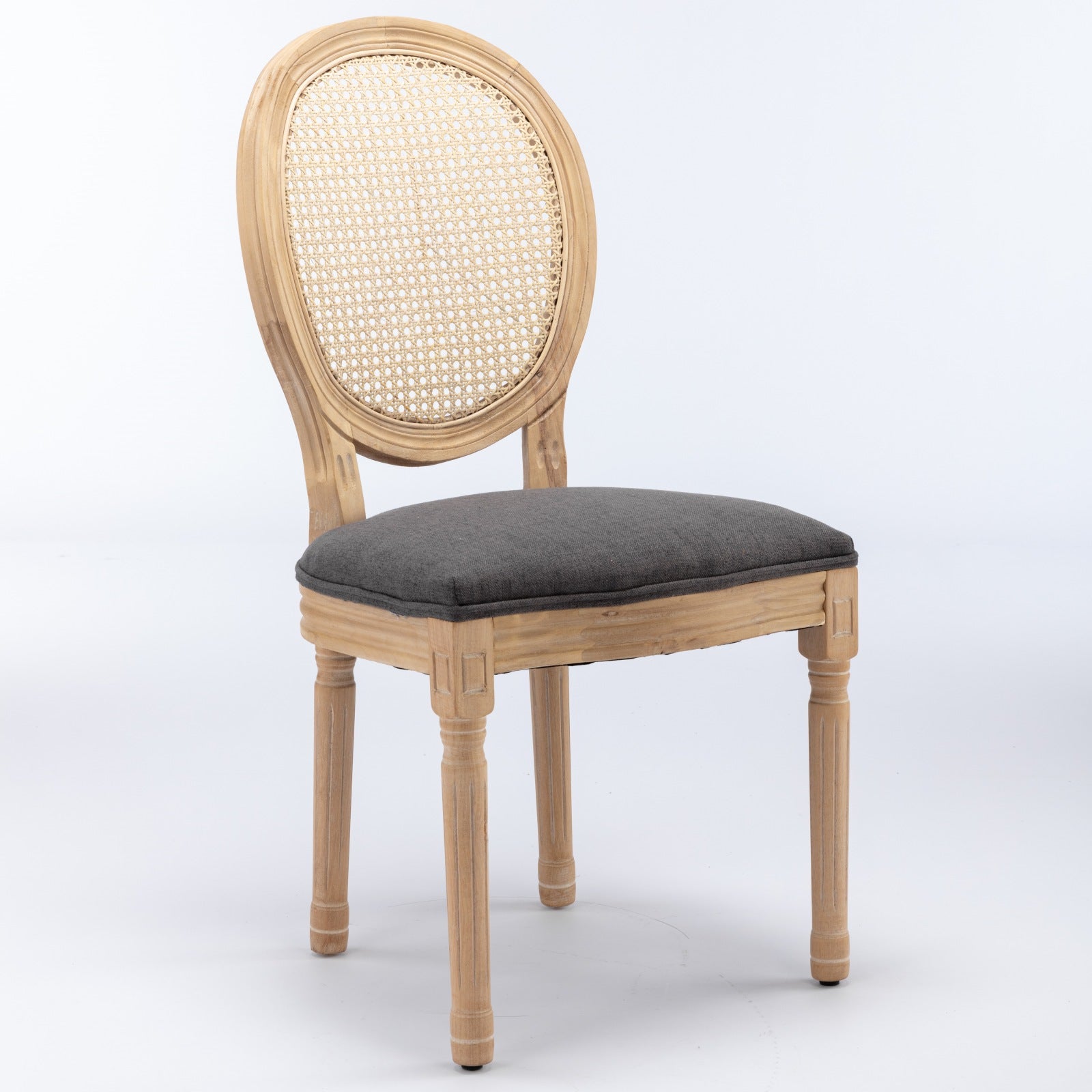 Ornate cane back accent chair with dark gray upholstered seat